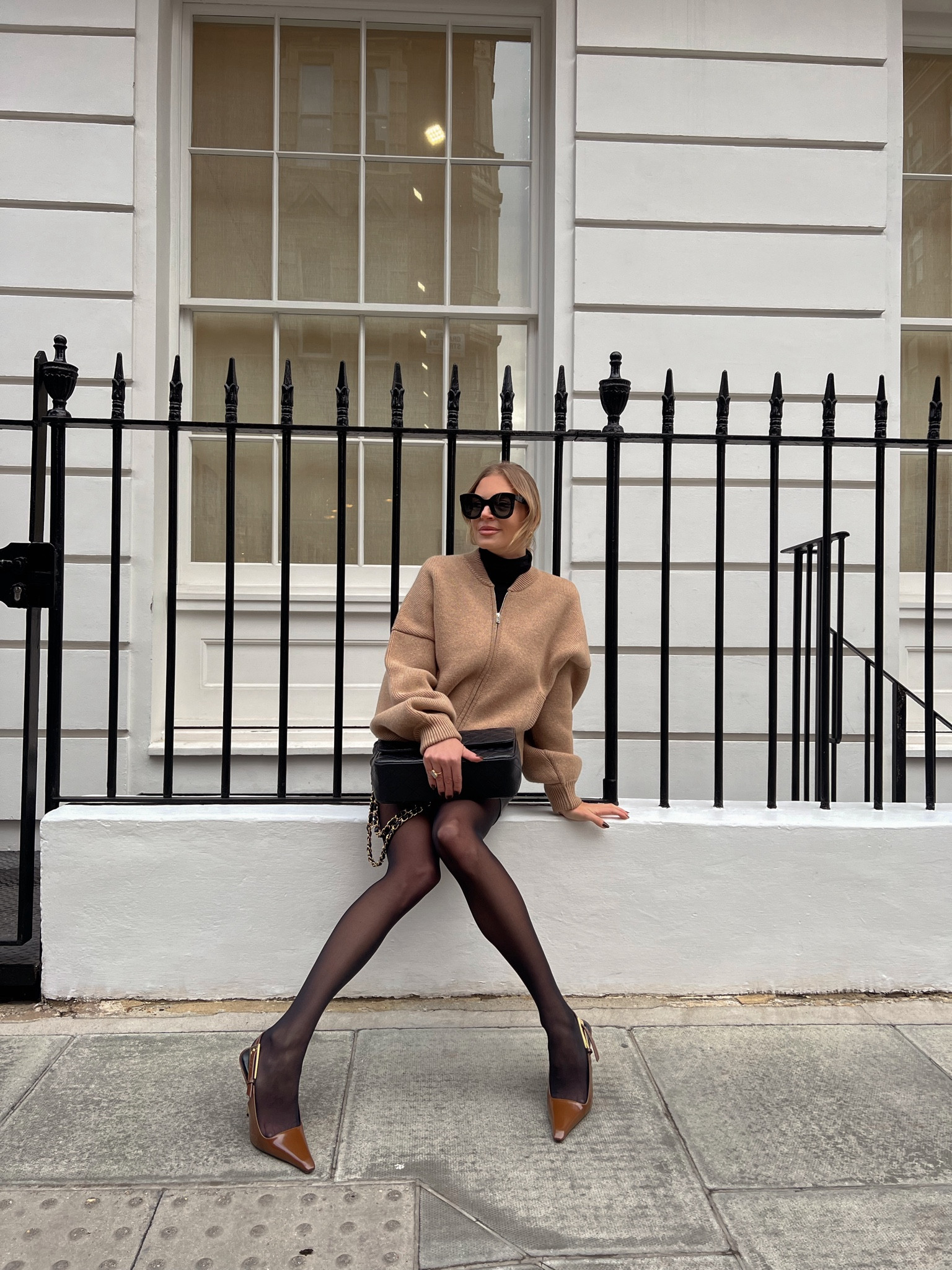 Net a Porter Khaite jacket Saint Laurent heels leather skirt Chloe cape 