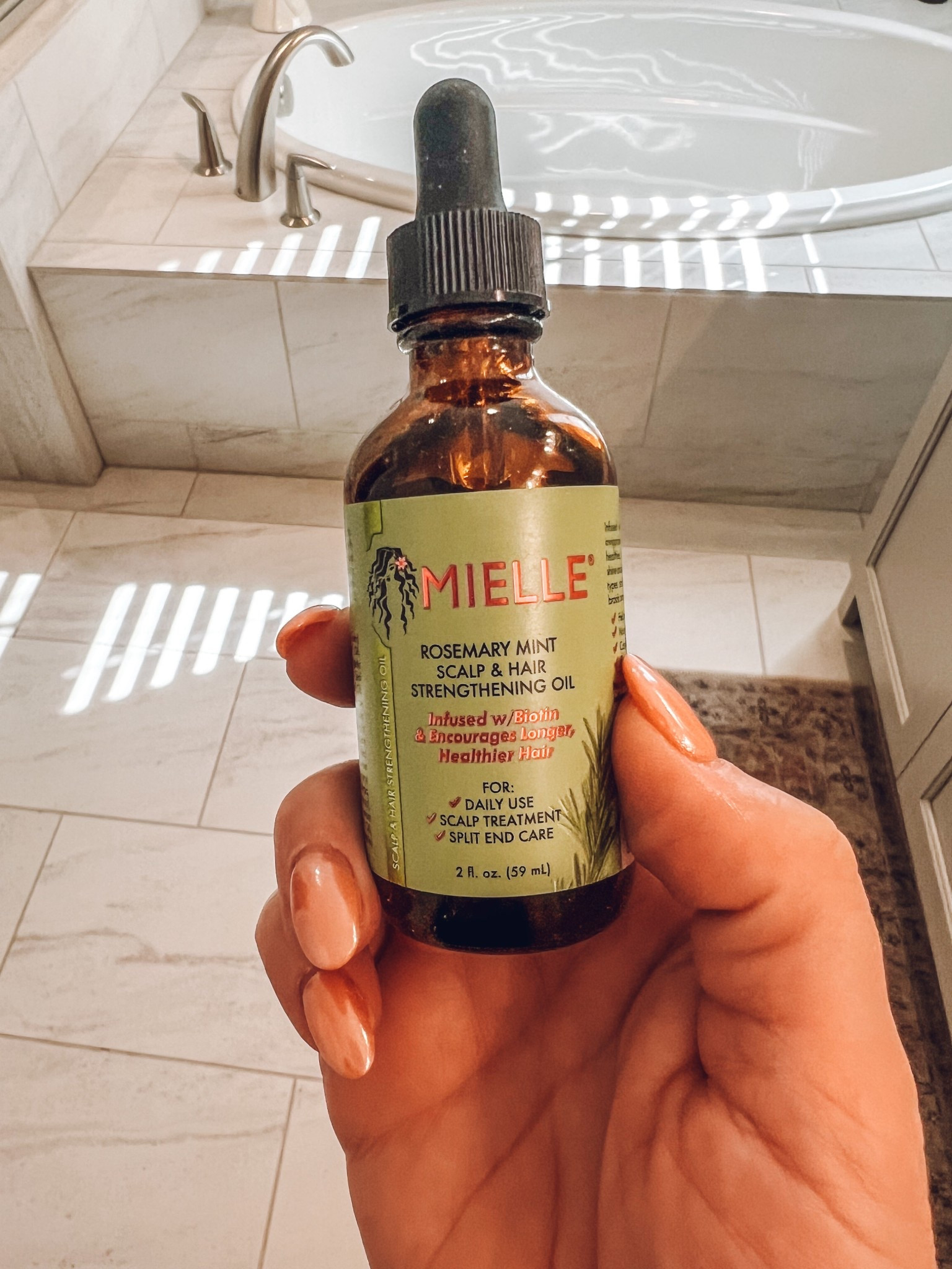 Mielle's Rosemary Mint Scalp & Hair
Strengthening Oil is another one of my favorite affordable beauty finds on Amazon.
It's infused with biotin, rosemary, and mint to help stimulate hair growth, strengthen strands, and soothe your scalp. I use it weekly for scalp massages, as a pre-wash treatment, and even to smooth flyaways.
If you're trying to grow your hair or reduce breakage-this oil is a must!
Under $10 right now 