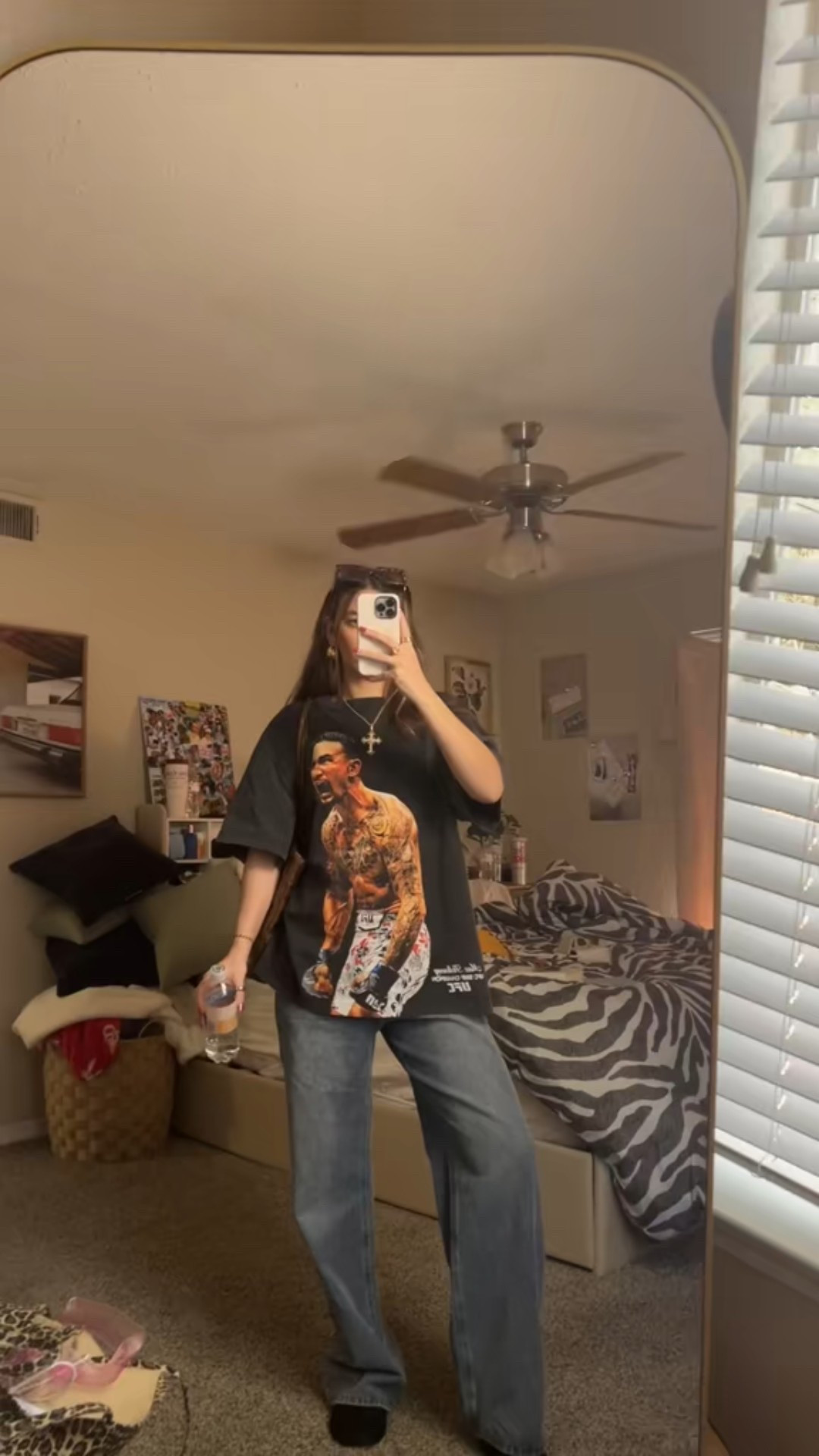Effortless off-duty style 🖤 This oversized graphic tee outfit is my go-to for casual days when comfort is key but I still want that cool, laid-back look. Styled with an oversized vintage-style UFC graphic tee and relaxed straight-leg jeans for an easy, worn-in feel. Finished with gold jewelry, sunglasses, and a shoulder bag for that model-off-duty aesthetic. Perfect for running errands, casual weekends, travel days, concerts, or everyday wear. Simple, timeless, and endlessly wearable.
Keywords: oversized graphic tee, vintage graphic tee, UFC shirt, band tee style, casual outfit, everyday outfit, off duty style, model off duty outfit, relaxed denim, straight leg jeans, baggy jeans outfit, street style outfit, effortless outfit, comfy chic, casual streetwear, neutral outfit, laid back style, capsule wardrobe, LTK outfit, LTK finds, casual fashion, minimalist street 

#LTKdayinmylife #LTKootd #LTKgrwm