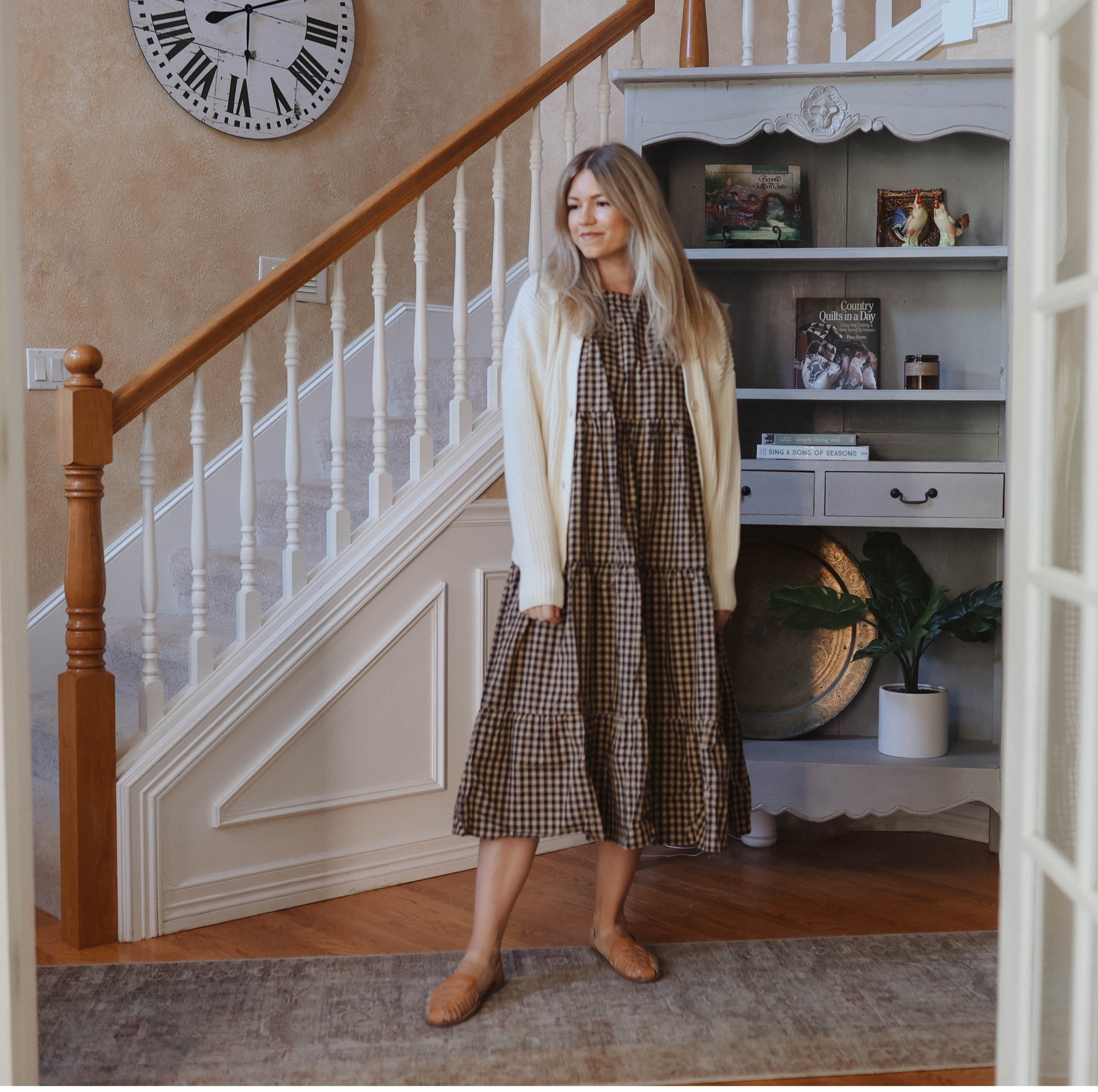 Wearing a small in the dress and a medium in the cardigan. 