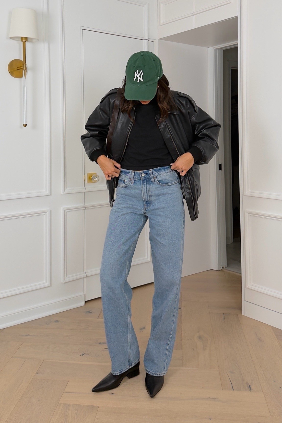 Sporty chic outfit I'd wear if I were going to a Super Bowl Party! 🏈 Wearing size S leather jacket (OOS but I’ve linked similar) I usually wear size 26 long in AF jeans but have been sizing up 3 sizes during pregnancy 

Abercrombie jeans 
Denim 
Winter outfit 
Winter fashion

#LTKSeasonal