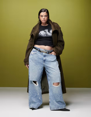 ASOS DESIGN Curve mid rise baggy boyfriend jeans with rips and paint splats in mid blue | ASOS (Global)