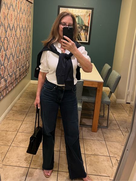  Sunday night and we are going out for a casual dinner. I'm wearing a favorite top from Veronica Beard, wide-leg jeans, and a sweater tied around my shoulders. All items run tts. 

#LTKitbag #LTKover40 #LTKSeasonal