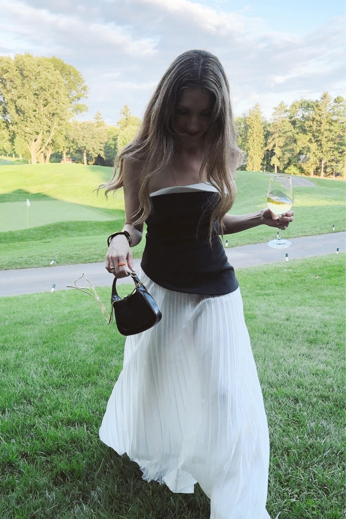 Black and white is white 🔥 right now! Pleated skirts and long top looks elegant! Get the look on Amazon for less! 

#LTKFindsUnder50 #LTKStyleTip #LTKParties