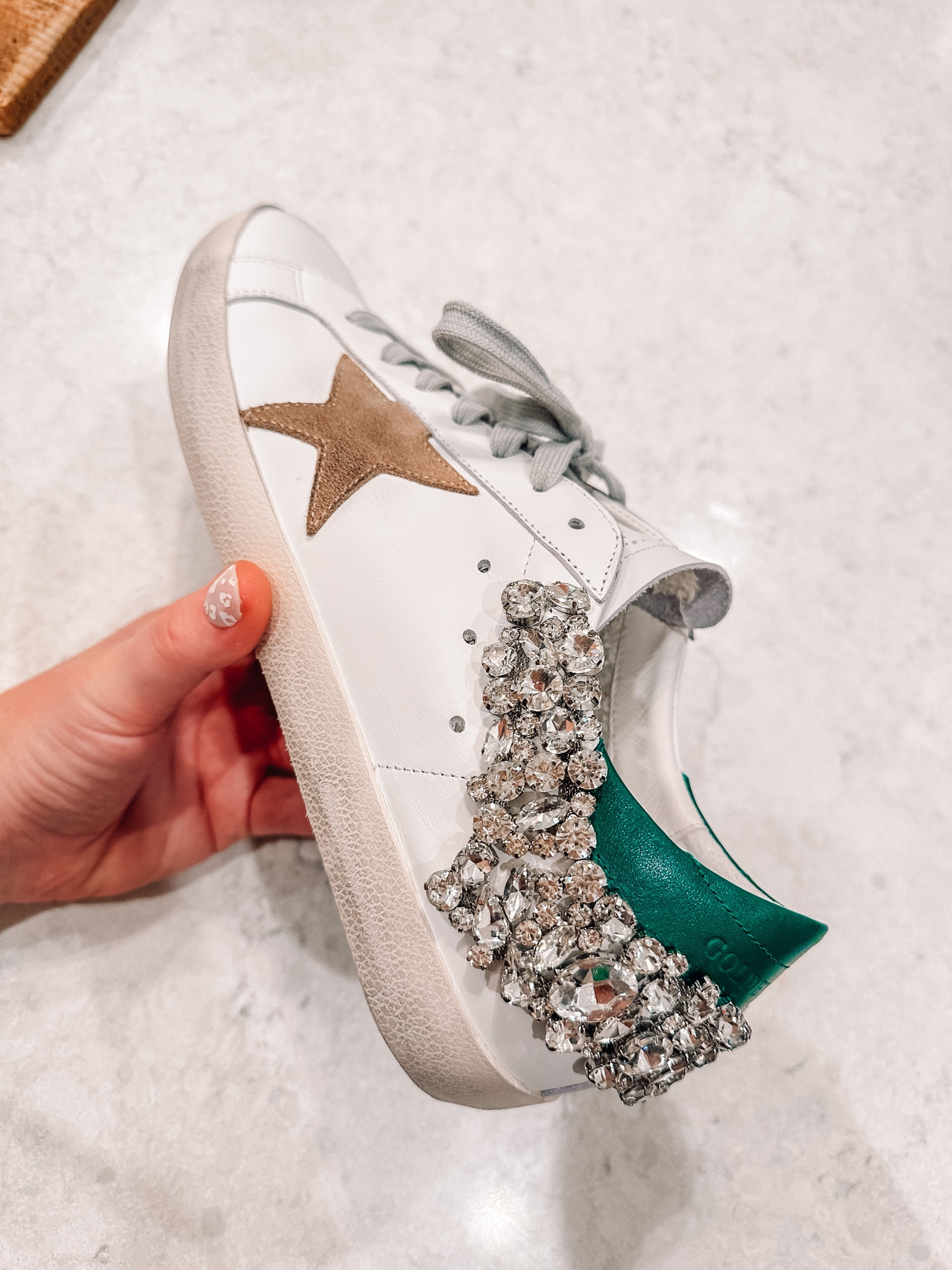 Linking the dupe for these sneakers 


Green golden goose 
Rhinestone golden goose 


#springoutfits #fall-favorites #LTKbacktoschool #fallfashion #vacationdresses #resortdresses #resortwear #resortfashion #summerfashion #summerstyle #LTKseasonal #rustichomedecor #liketkit #highheels #Itkhome #Itkgifts #Itkgiftguides #springtops #summertops #Itksalealert
#LTKRefresh #fedorahats #bodycondresses #sweaterdresses #bodysuits #miniskirts #midiskirts #longskirts #minidresses #mididresses #shortskirts #shortdresses #maxiskirts #maxidresses #watches #backpacks #camis #croppedcamis #croppedtops #highwaistedshorts #highwaistedskirts #momjeans #momshorts #capris #overalls #overallshorts #distressesshorts #distressedjeans #whiteshorts #contemporary #leggings #blackleggings #bralettes #lacebralettes #clutches #crossbodybags #competition #beachbag #halloweendecor #totebag #luggage #carryon #blazers #airpodcase #iphonecase #shacket #jacket #sale #under50 #under100 #under40 #workwear #ootd #bohochic #bohodecor #bohofashion #bohemian #contemporarystyle #modern #bohohome #modernhome #homedecor #amazonfinds #nordstrom #bestofbeauty #beautymusthaves #beautyfavorites #hairaccessories #fragrance #candles #perfume #jewelry #earrings #studearrings #hoopearrings #simplestyle #aestheticstyle #designerdupes #luxurystyle #bohofall #strawbags #strawhats #kitchenfinds #amazonfavorites #bohodecor #aesthetics #blushpink #goldjewelry #stackingrings #toryburch #comfystyle #easyfashion #vacationstyle #goldrings #fallinspo #lipliner #lipplumper #lipstick #lipgloss #makeup #blazers #primeday #StyleYouCanTrust #giftguide #LTKRefresh 
#LTKHalloween #LTKFall #fall #falloutfits #backtoschool #backtowork #LTKGiftGuide #amazonfashion #traveloutfit #familyphotos #liketkit #trendyfashion #fallwardrobe

#LTKFind #LTKshoecrush #LTKU