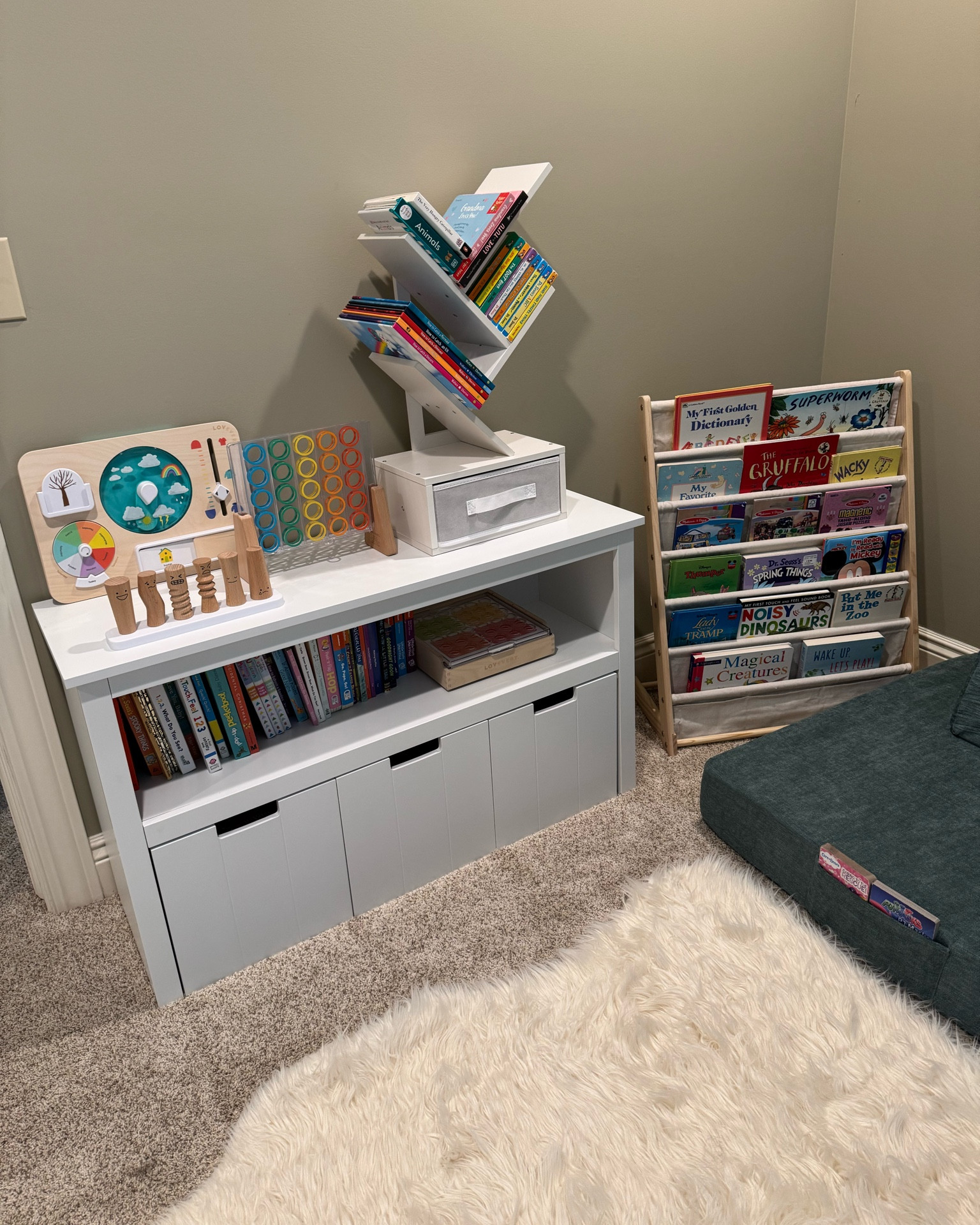 Reading book 📕 in the loft ❤️ bookcase. Bookshelf. Temu finds. Cozy reading nook. Toddler reading room. Playroom
Decor. Playroom ideas. Book tree. Book display. Bookcase. Book storage solutions. Home organization. 

#LTKHome #LTKFamily