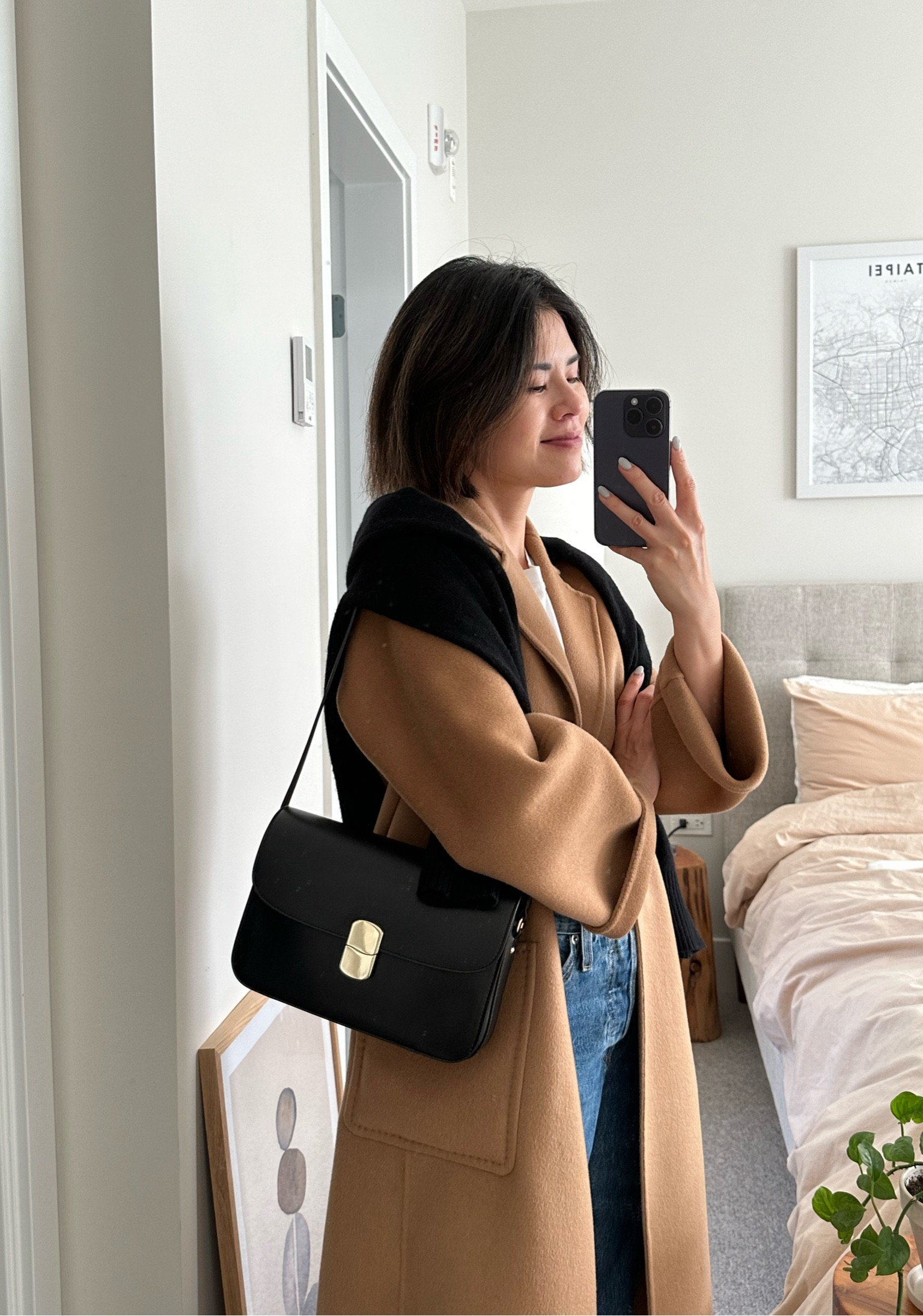 Coat: curated. Linked similar 
Bag: Sezane Milo classic. It’s a very roomy and good quality bag. Love it
Sweater: Everlane tts 