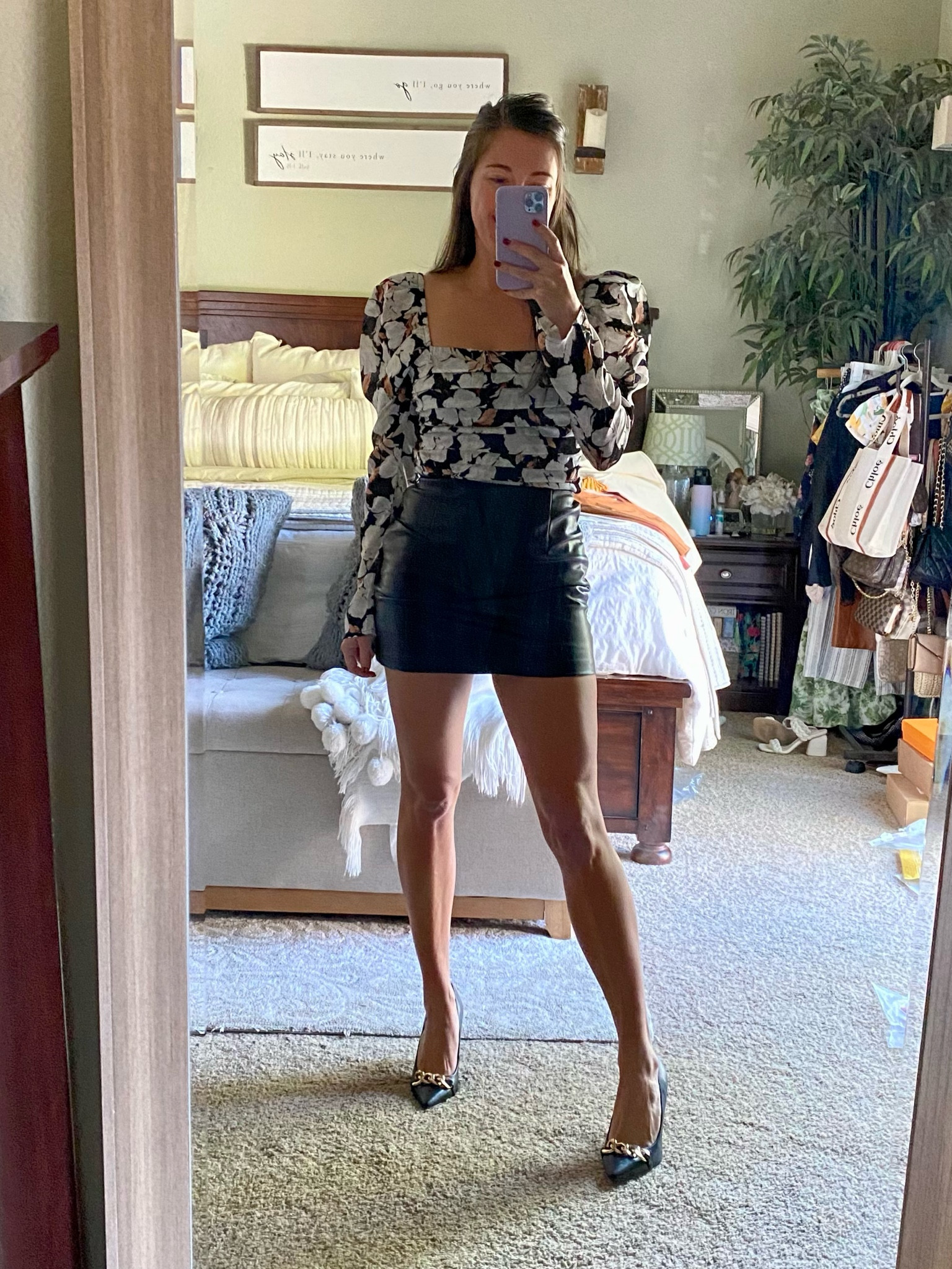 Leather skort puff sleeve floral blouse top gold chain heels 

#LTKstyletip #LTKsalealert #LTKshoecrush