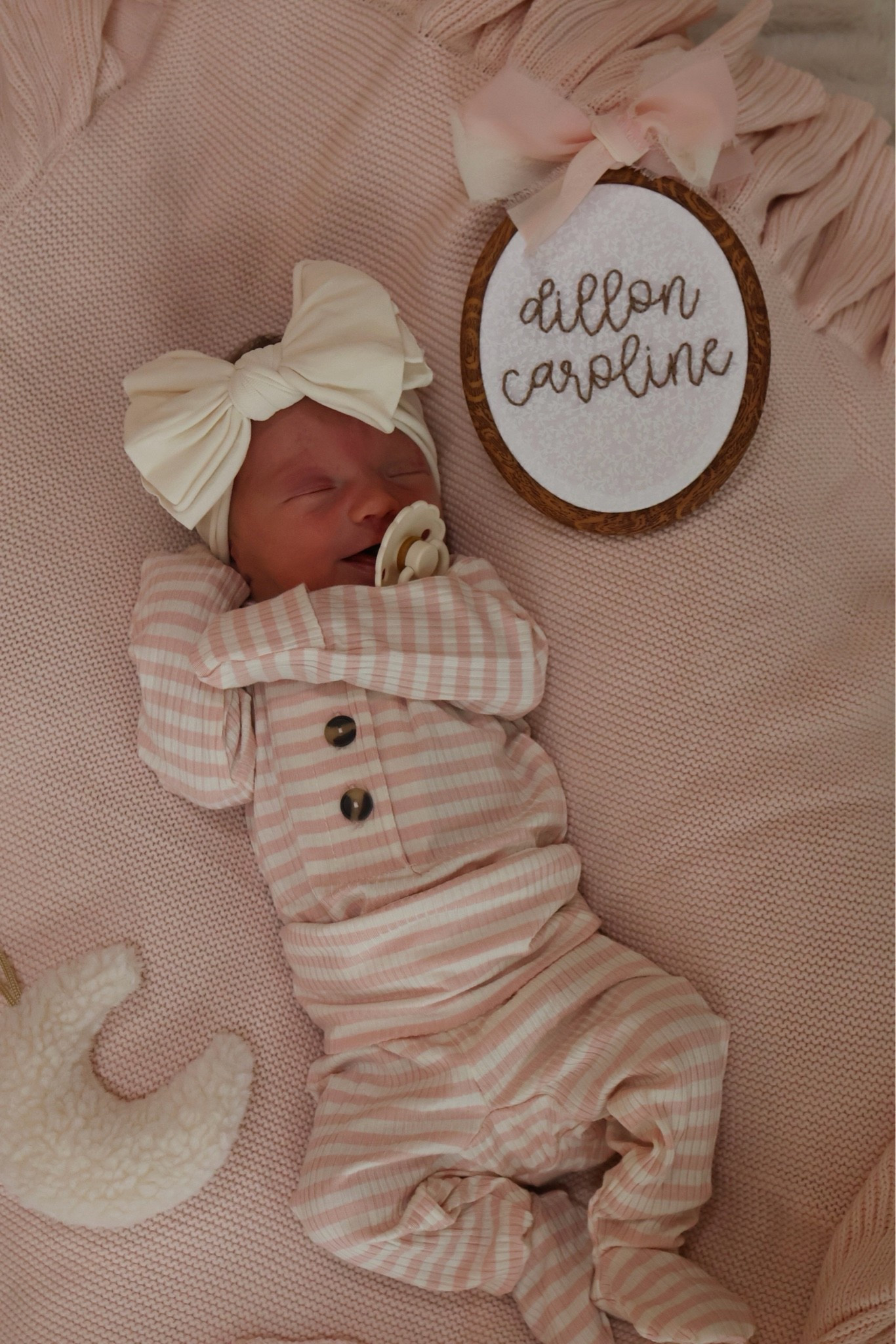 She’s wearing Newborn-3Months! These sets run a smidge big but they’re so soft and cute!