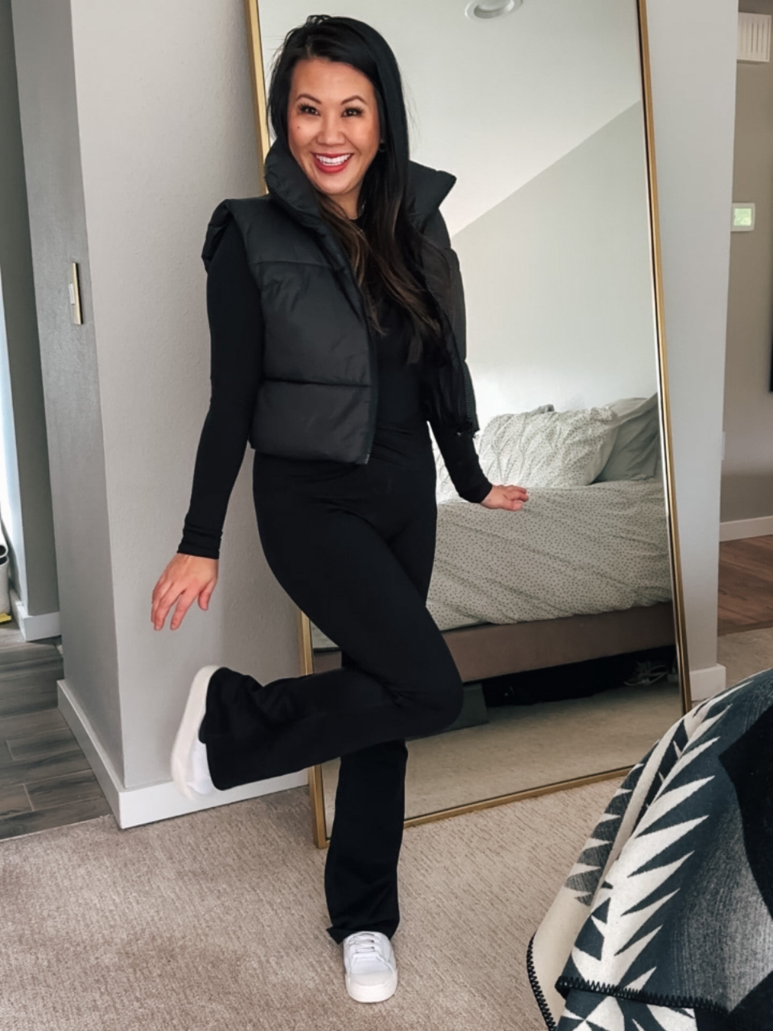 Black crop puffer vest
Flare pants
Black bodysuit 
Casual pants 
Casual outfits 


#LTKsalealert #LTKfit #LTKstyletip