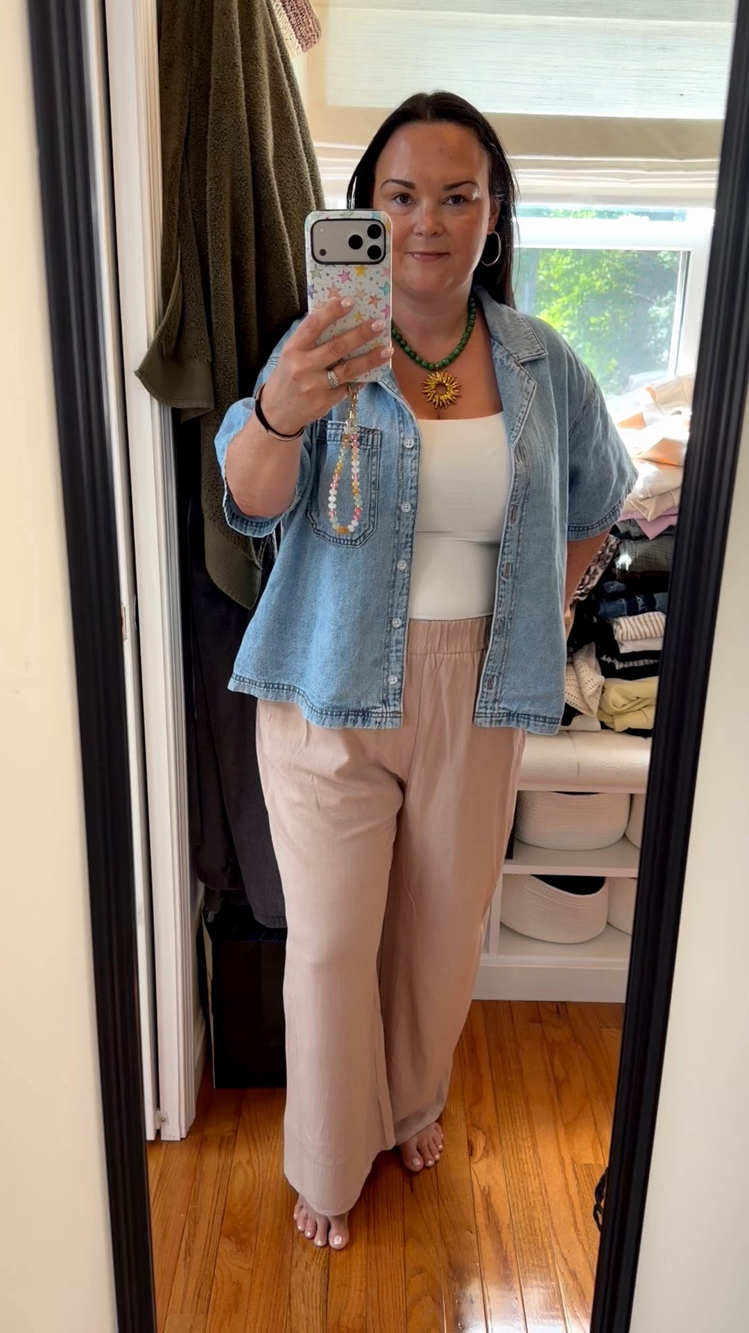 Summer outfit formula I keep reaching for ☀️

If shorts aren’t your thing, lightweight pull-on pants are such a good alternative. They’re breathable, belly-friendly, and don’t leave me counting the minutes until I can change.

Paired with a double-lined tank, an oversized chambray shirt, and comfy sandals, this is one of those outfits that feels put together without trying too hard.

#LTKootd #LTKMidsize #LTKSeasonal