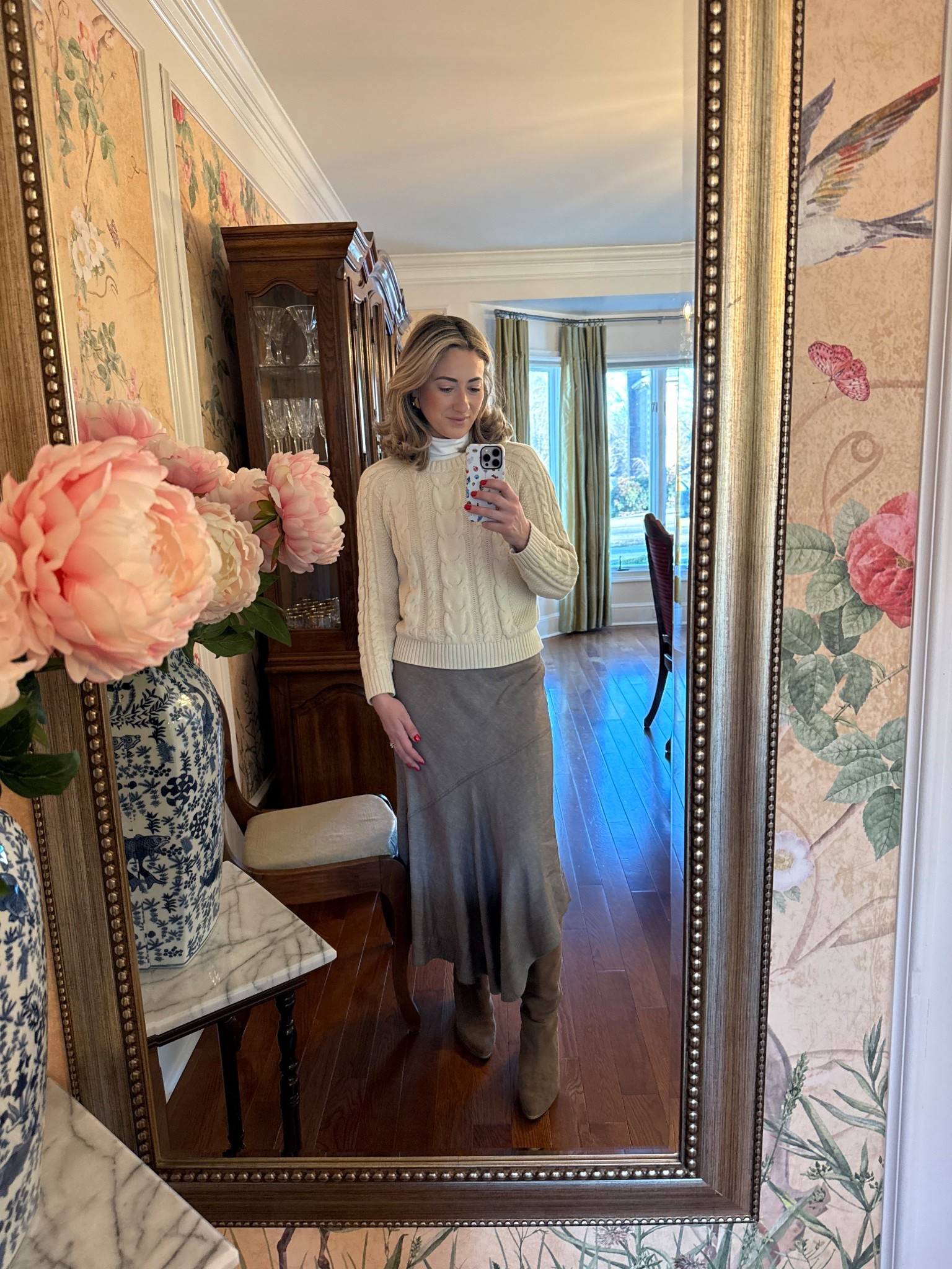 Classic layers I’ll never get tired of 🤍 A cozy cable knit styled over a turtleneck, paired with a flowy skirt and boots for that effortless winter look. This is one of my favorite ways to feel put together while still staying comfortable. timeless, feminine, and easy to recreate.

#LTKWorkwear #LTKgrwm #LTKootd