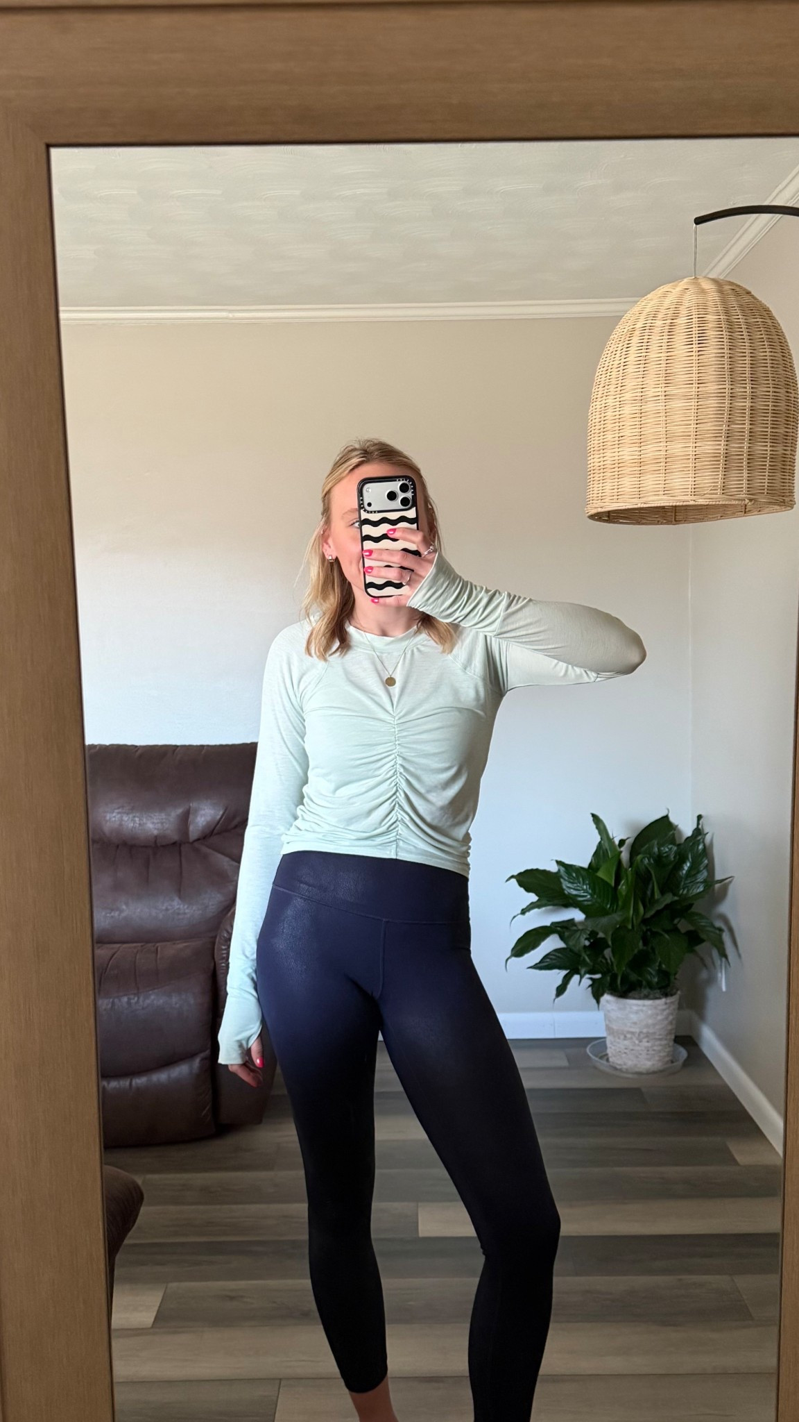 the most flattering workout long sleeve!! I am constantly reaching for this one. I linked a similar version on Amazon too! 