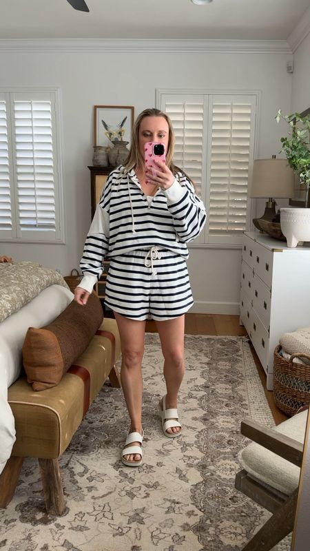 Got this cute striped top and shorts. It’s sold separately. I love the top with just regular shorts too! But they great together too. Wearing a medium in both top and bottoms. 

#LTKover40 #LTKSpringSale #LTKmidsize