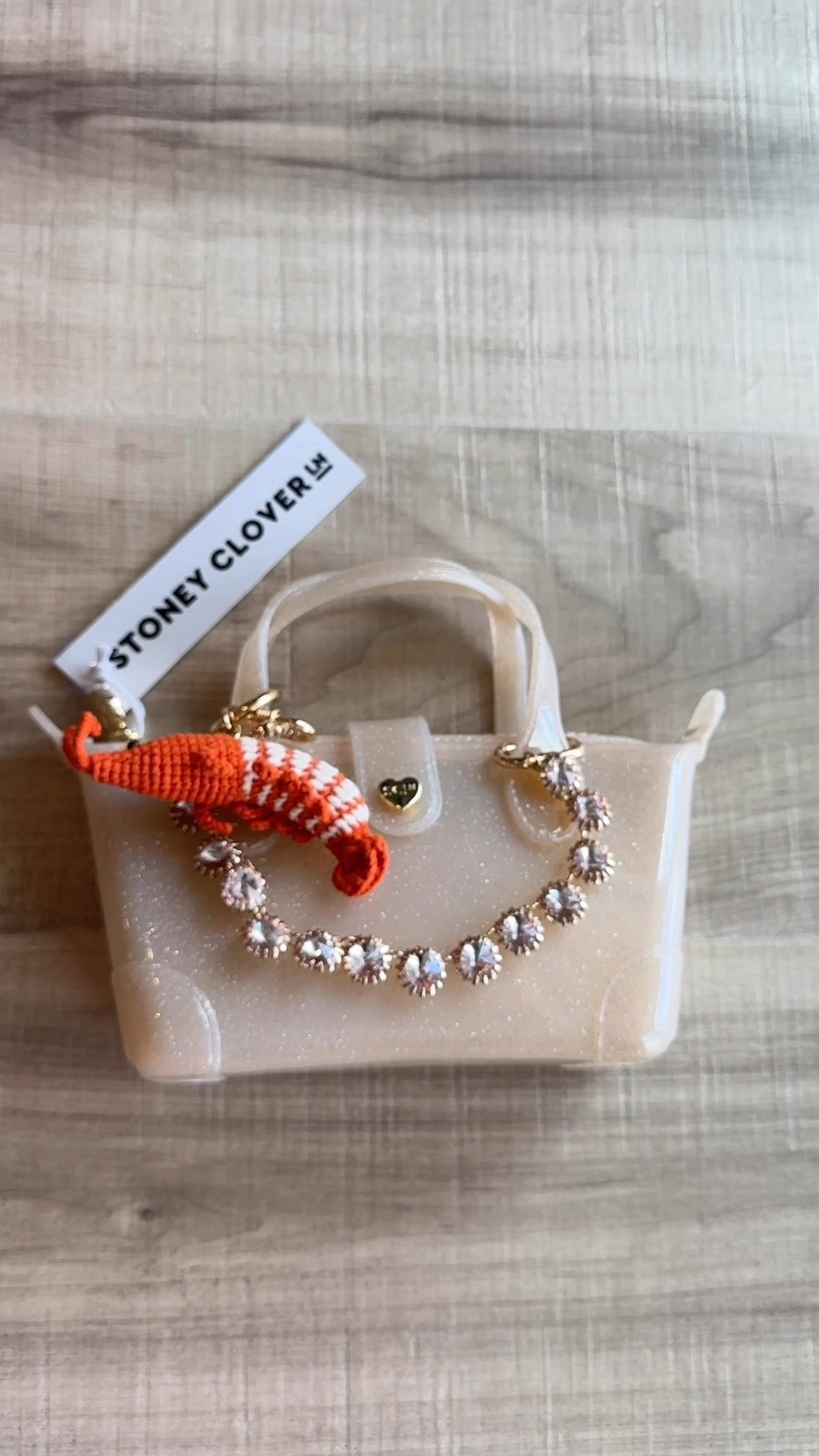 Stoney clover pouchette and bag charms - no better combo exists! Small purses, small bags, jelly purse, sparkle purse, shrimp, bag charms, bag chains, Anthropologie 

#LTKStyleTip #LTKItBag #LTKSaleAlert