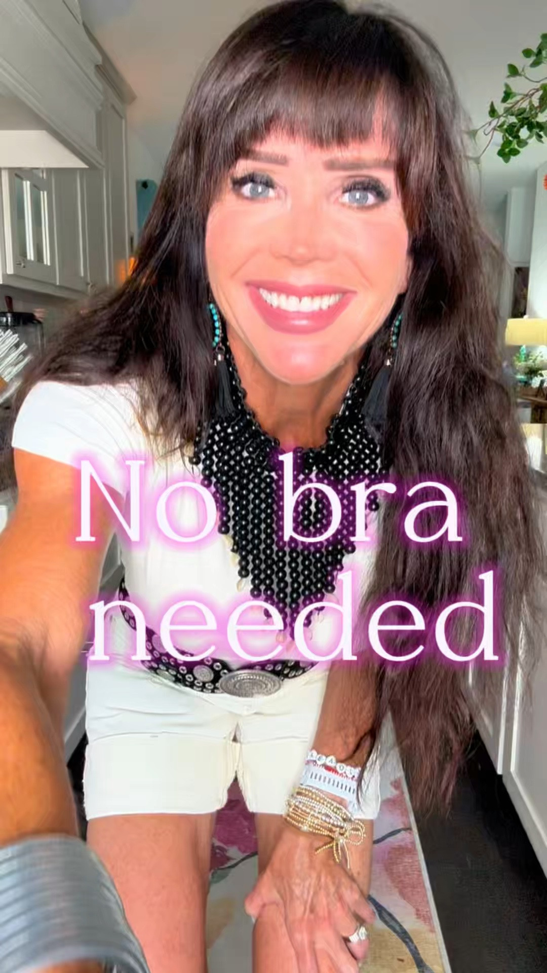 I saw this tee on @affordableamy and when she said it had a built in bra I had to try it!  I have to say it’s a super weird feeling at first but I was surprised at how comfy it was and I did feel supported!!  I added my fav booties, my 3rd statement necklace like this, and loves this cream and black look!  👀

#LTKootd #LTKActive #LTKOver40