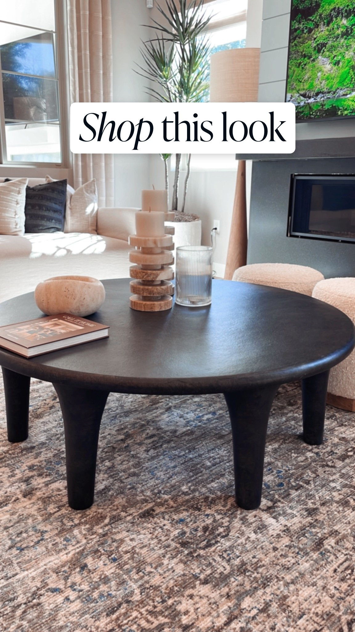The Kelden Coffee Table by Four Hands is so pretty! Perfect dark wood round coffee table for a larger living room space. 

I also linked a similar floor lamp to the one in the background. 

#LTKSaleAlert #LTKHome