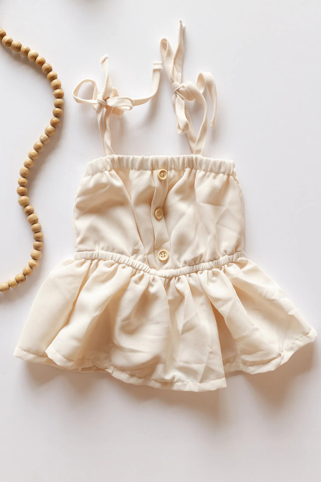 tera tie peplum top ivory / 0-3m | mode