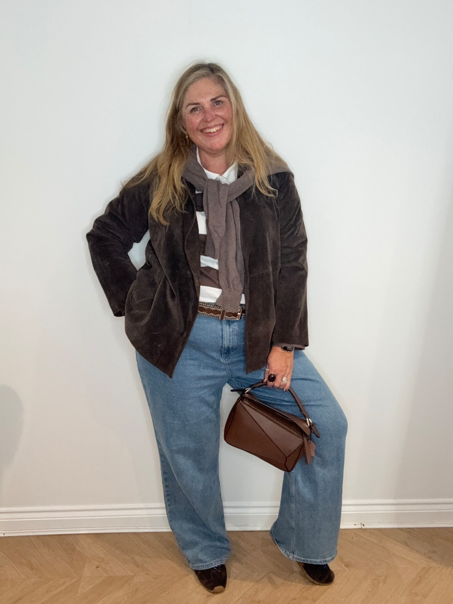 Suede jacket, striped top, wide leg jeans, belt, chocolate bag, suede trainers, chunky hoops, lipstickk

#LTKautumn #LTKjeans #LTKplussize