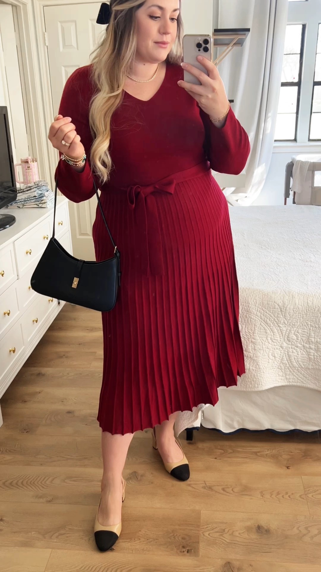 The perfect holiday dress that’s festive without being over the top. This deep red pleated midi is flattering, bump-friendly, and so easy to style with classic cap-toe heels and a simple black bag. Whether it’s a work event, Christmas dinner, or a dressy holiday party, this look feels elegant, timeless, and effortless.

holiday dress, red pleated dress, Christmas outfit idea, bump friendly style, maternity outfit, holiday party outfit, classic holiday look, elegant winter outfit, Christmas dinner outfit, timeless holiday style, chic festive outfit

#LTKootd #LTKMidsize #LTKHoliday