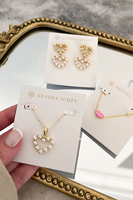 These new arrivals from Kendra Scott are  stunning!!! So cute for Valentine’s Day! 🥰

Pearl heart necklace, pearl heart earrings, lips necklace, gold jewelry, affordable jewelry, fashion jewelry, accessories, gift ideas for her, fancythingsblog

#LTKfindsunder100 #LTKfindsunder50 #LTKstyletip