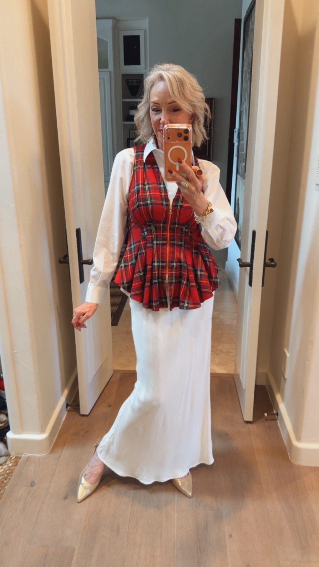 I have worn this white satin maxi skirt through all 4 seasons. Endless ways to style it. 
Also, Chico’s does the best white no-iron white button front shirt. I wear a size 0 in Chico’s unique sizing. A wardrobe basic. 
Sling back light gold kitten heel pump another wardrobe basic. 
Add a vest or jacket of your choice. 

#LTKHoliday #LTKSeasonal #LTKOver40