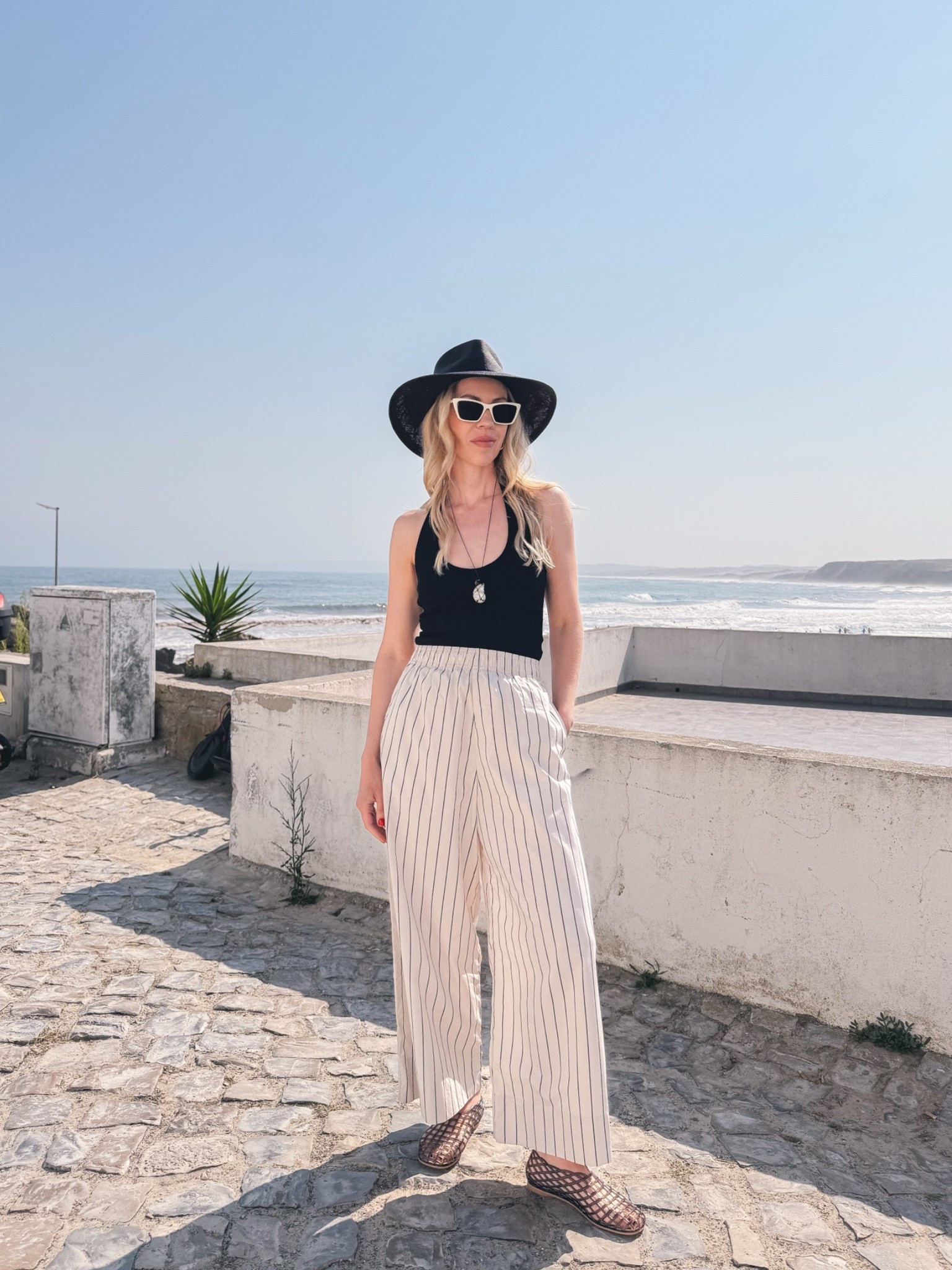 Summer vacation outfit, European summer, @Zara halter top, striped wide leg pants, jelly shoes, seashell necklace

#LTKTravel #LTKSeasonal #LTKSaleAlert