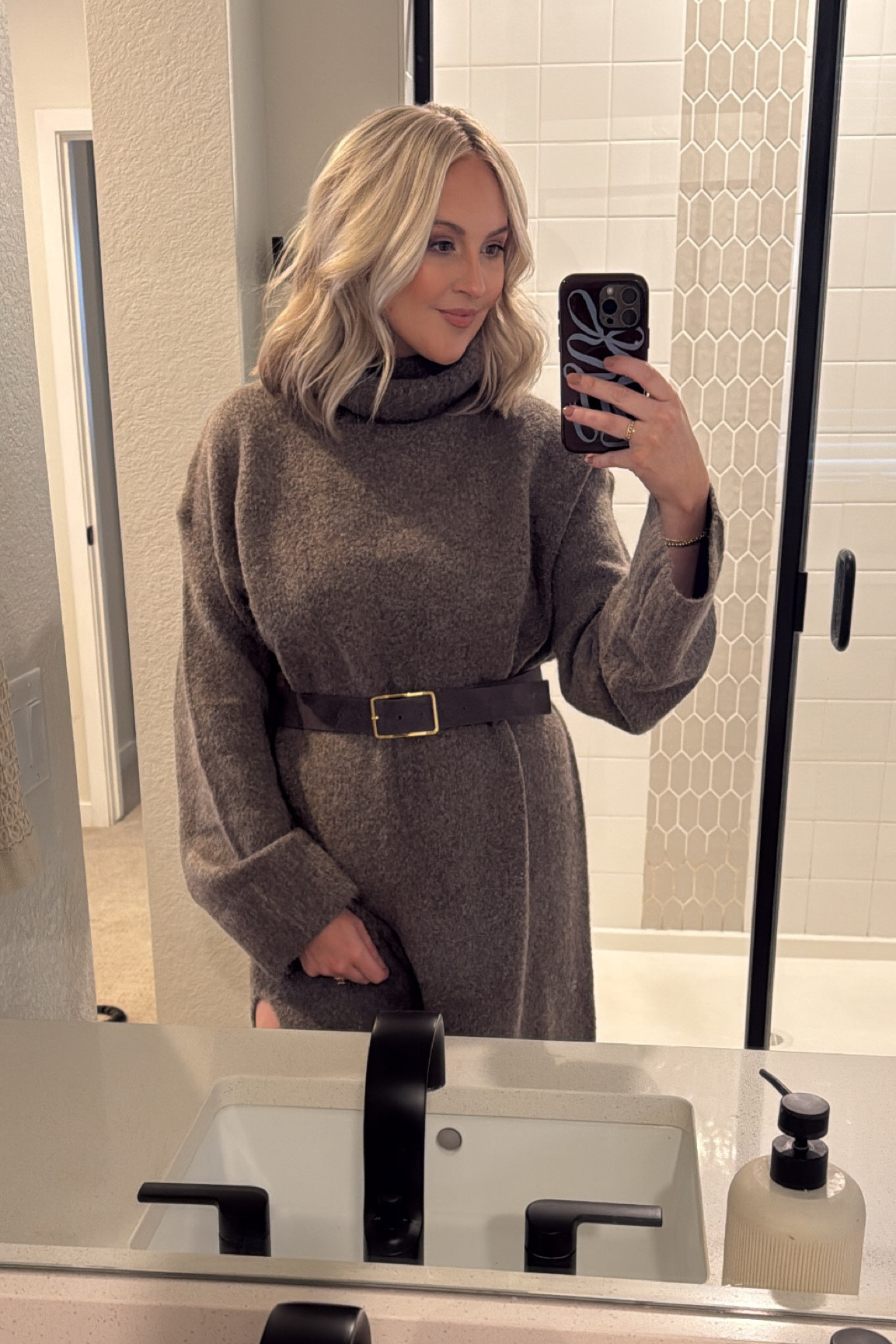 The perfect maxi sweater dress. Feels and looks expensive and only $131. 

I wore this at 6 weeks postpartum for family photos and felt fantastic. Size medium. 

Wearing the belt in Charcoal from the
B-low The Belt site. 

#LTKBaby #LTKBump #LTKFamily