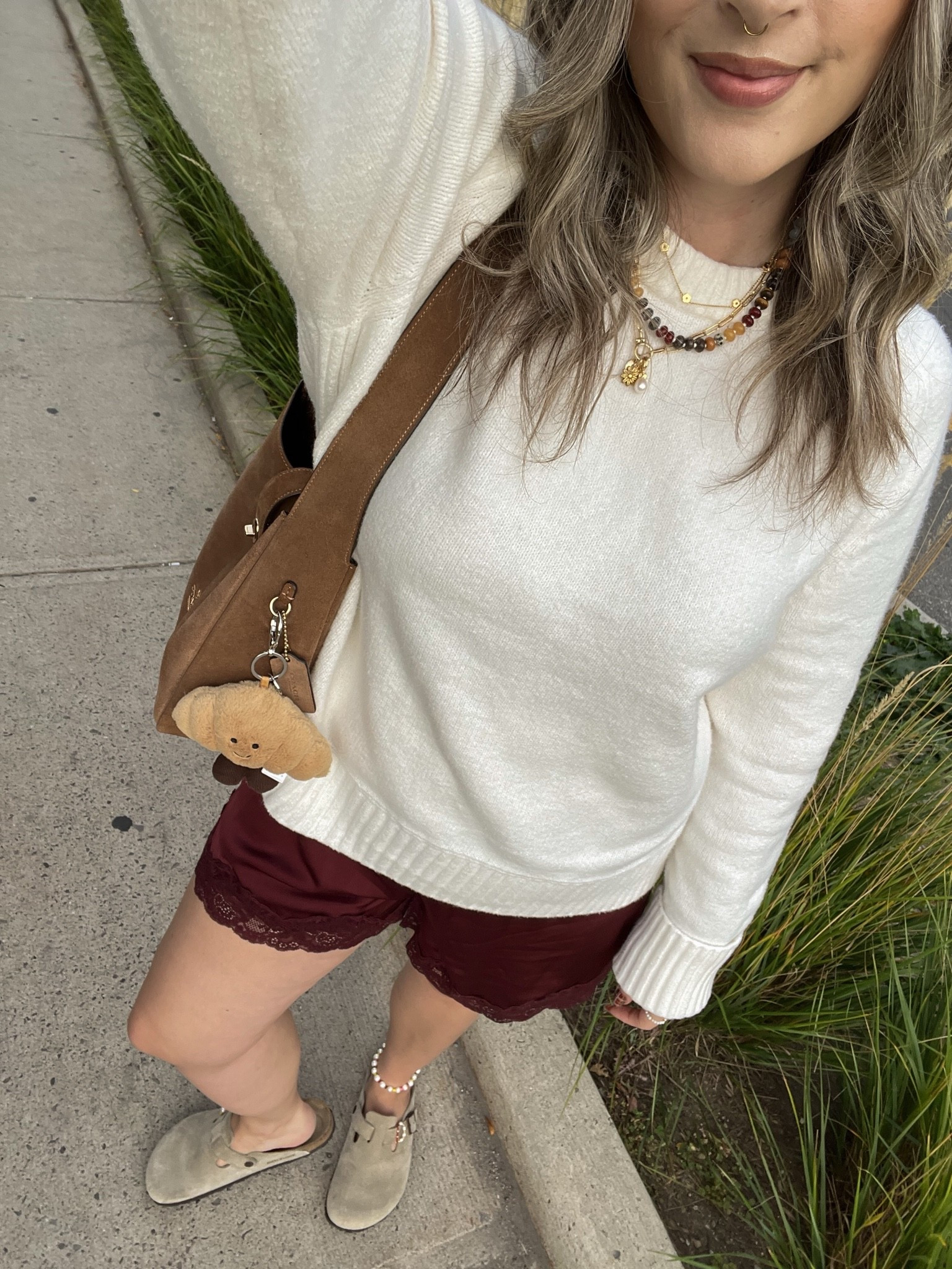 Comfy early fall outfit! Sized up to XL in the sweater for an oversized fit. Wearing M in the satin lace shorts. I’m a 9.5-10 shoe and wear a 40 in the Birkenstock clogs

#LTKfall #LTKsale #LTKstyletip