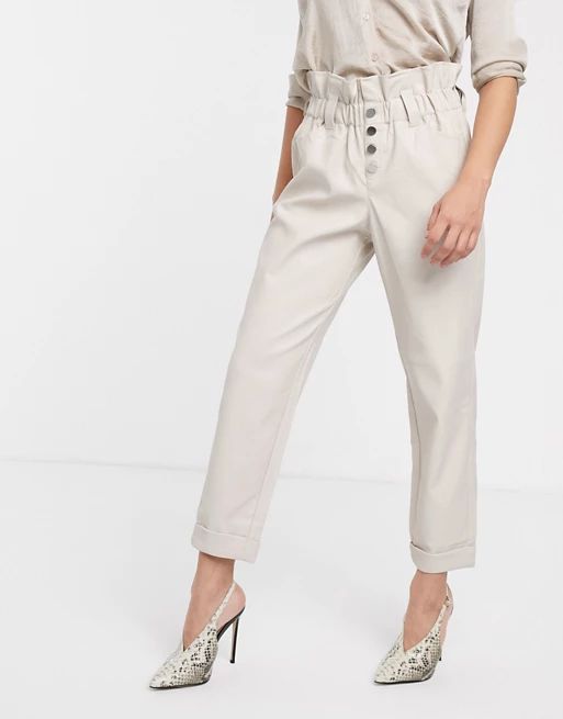 River Island faux leather peg trousers with gathered waist in off white | ASOS UK