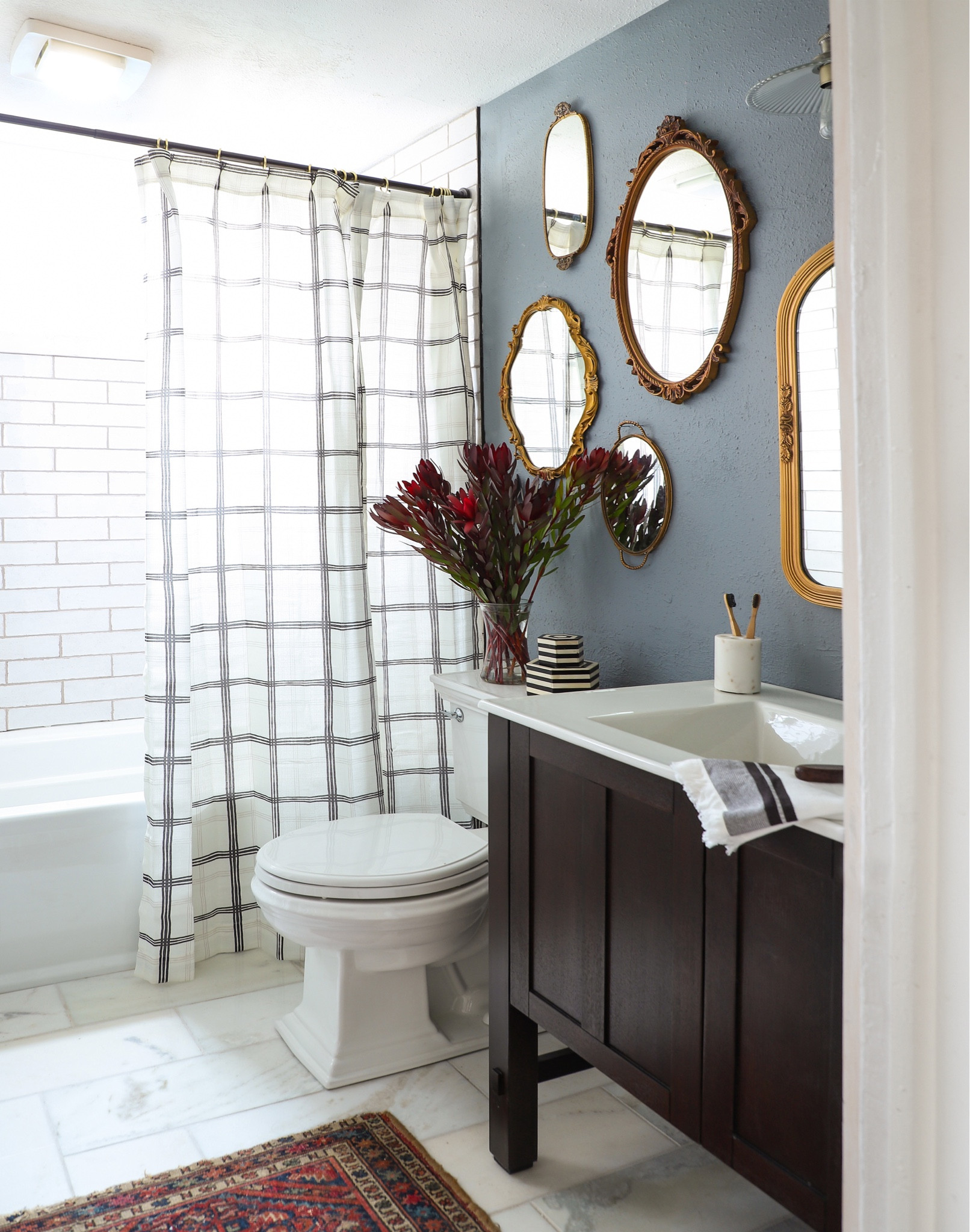 I thrifted these gold mirrors. Adding them to the Duplex bathroom wall have the space the WOW factor. 

#LTKhome