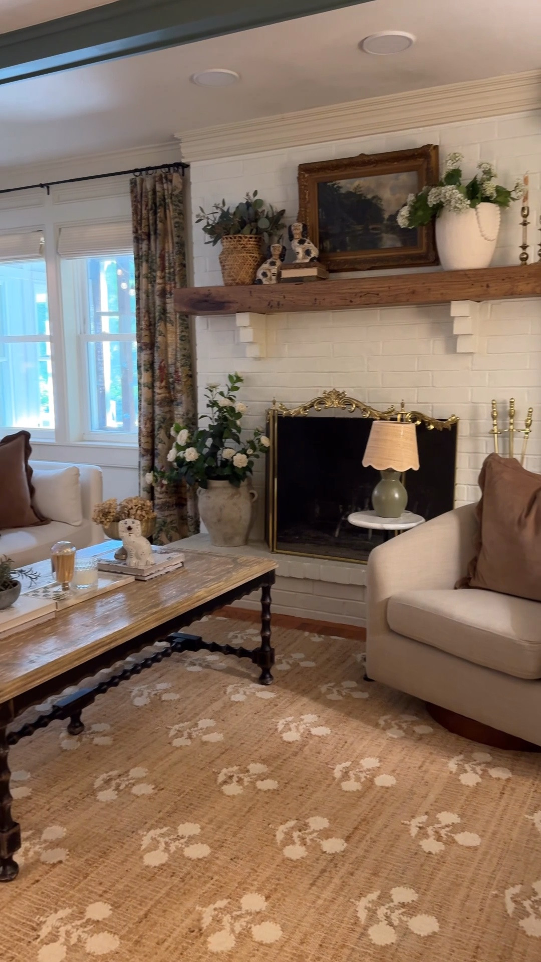 Living room refresh, coffee table, upholstered swivel armchair, hand woven wool and jute area rug, scallop velvet pillows, velvet pillow covers, table lamp with scallop lampshade, layered living room.

#LTKSeasonal #LTKHome #LTKSaleAlert