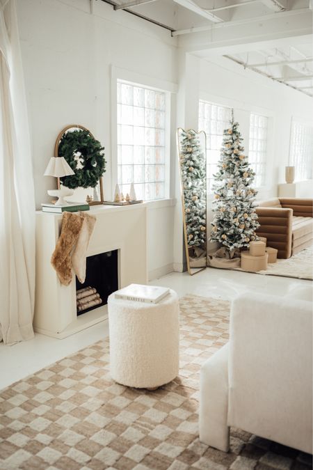 Christmas holiday decor: $75 faux flocked tree, wreath, Sherpa pouf with wood legs, cream sofa, Carmel color sofa, cream checkered rug, Christmas stockings 

#LTKhome #LTKHoliday #LTKSeasonal