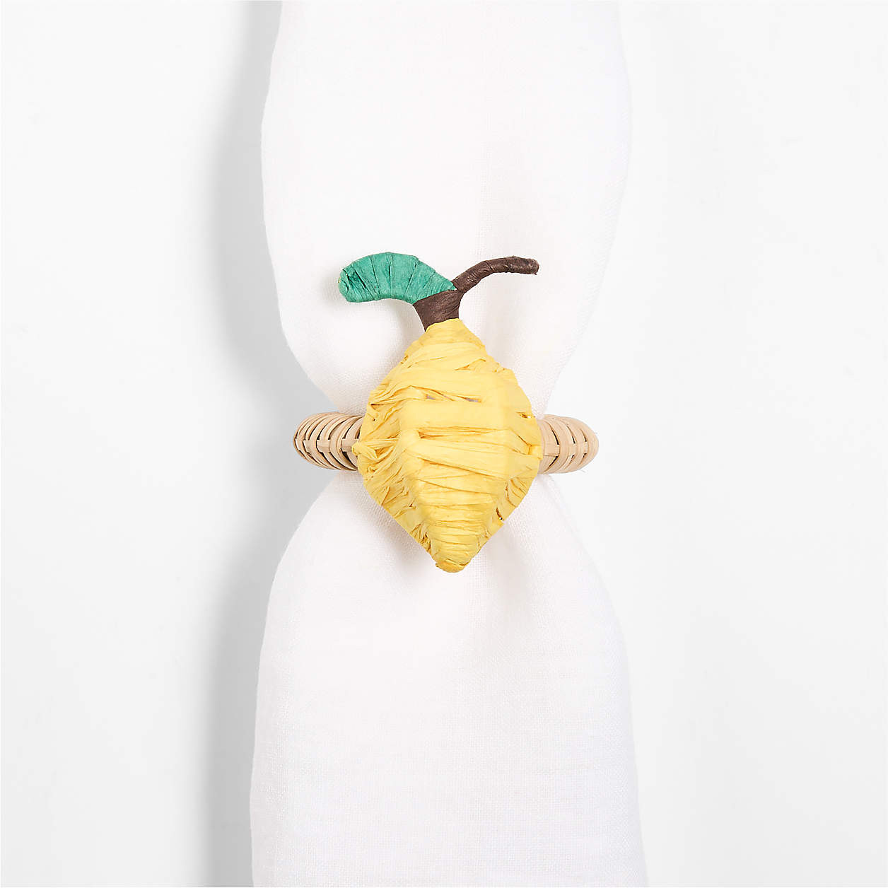 Lemon Rattan Napkin Ring | Crate & Barrel | Crate & Barrel