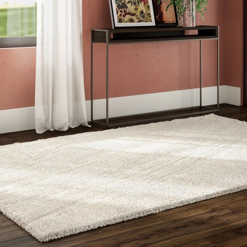 Starr Hill Solid Ivory Area Rug | Wayfair North America
