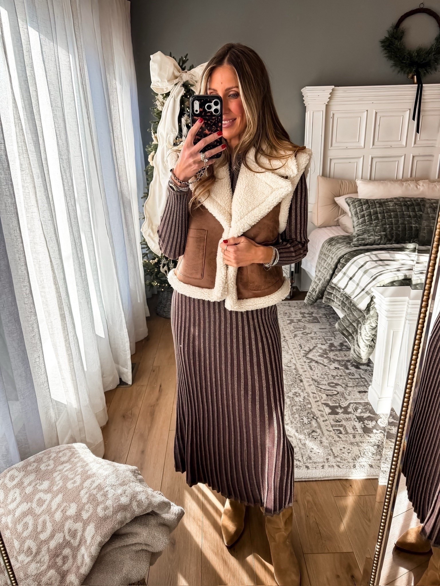 Midi sweater dress paired with a faux fur vest, suede booties, chic winter look, date night, work outfit, themominstyle


#LTKootd #LTKSeasonal #LTKOver40