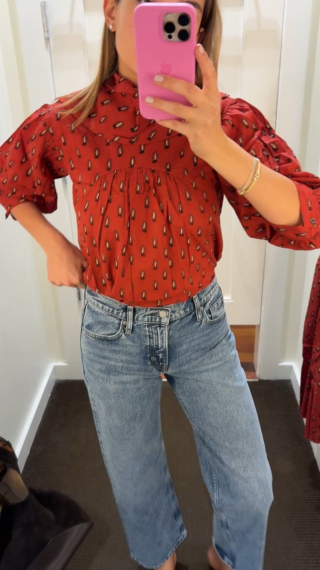 Wearing a 26 and small top