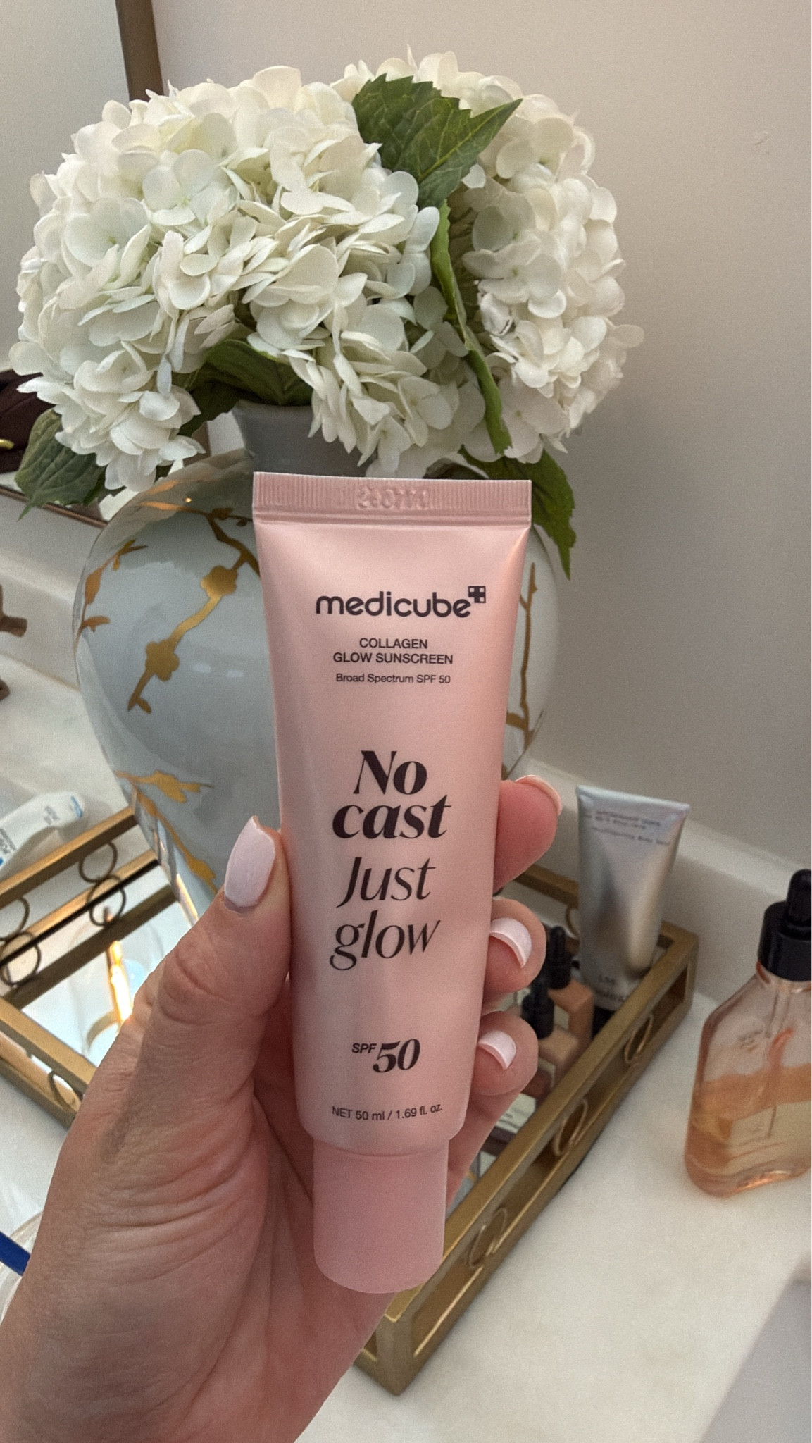Love this sunscreen for a glowy look! 

Sunscreen, skincare 