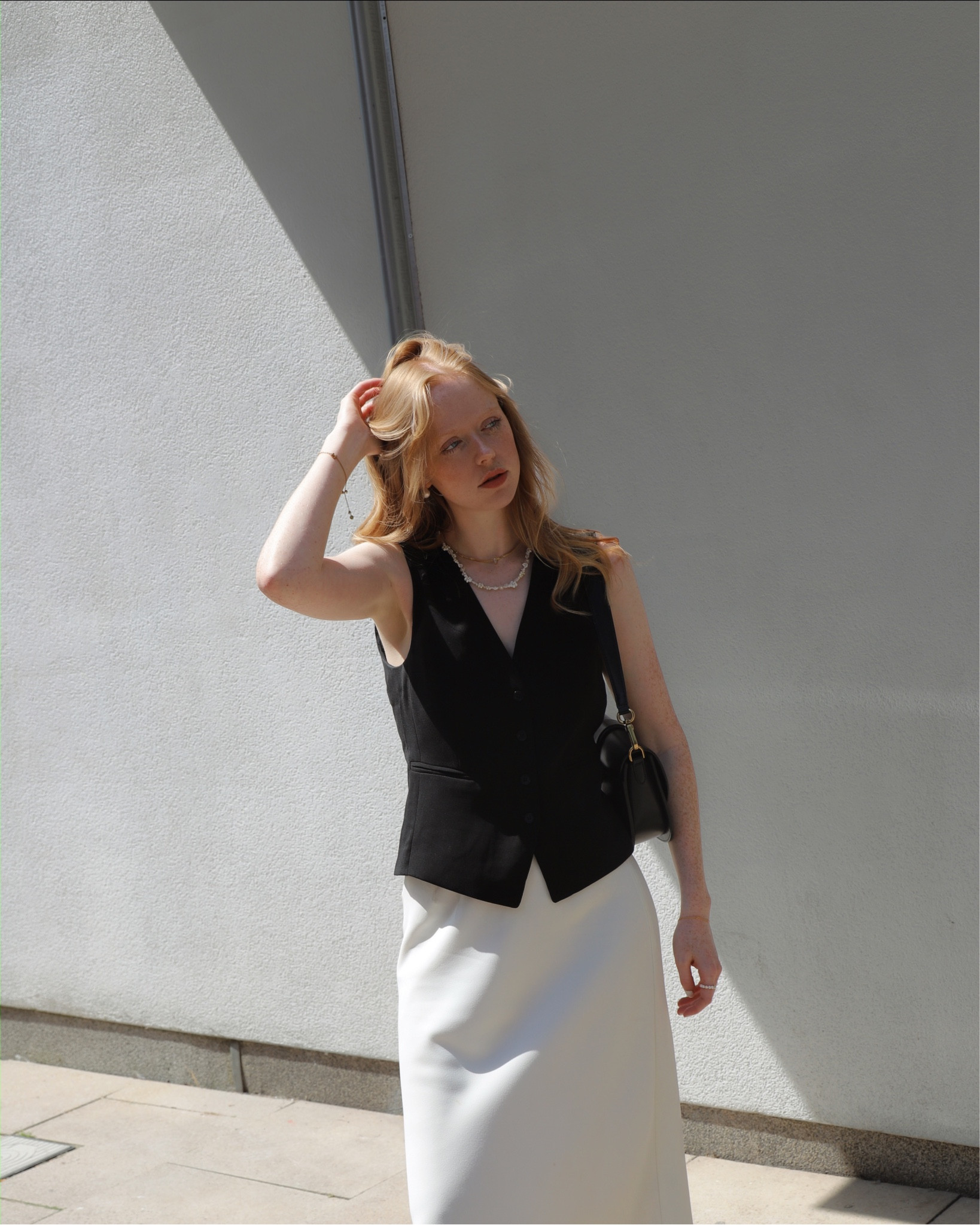 🌞🖤

minimal, waistcoat, midi skirt, black, white, monochrome, summer outfit, spring outfit, black waistcoat, white skirt, black and gold bag, comfy slides, slides, sandals.

#LTKunder50 #LTKSeasonal #LTKunder100