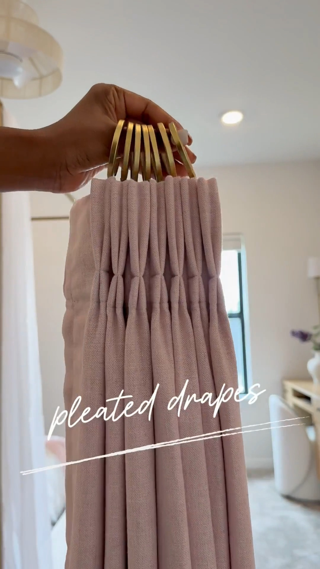 I'm absolutely in love with how her drapes turned out 👌🏾…..I've also got the same drapes in our guest room and great room.

Like many of you, I received a hefty quote for drapes a few years ago - 10K to be exact…..and that was just for three windows. 😅 I mean, who doesn't love the look of custom drapes? I particularly love the pinch pleat - it's my favorite. 😍 

One thing to keep in mind with this system is that you'll need to account for roughly 6 inches of slack. 🤎 So if your ceiling height is 108 inches, you'll need to order 102-inch drapes if you want to hang the rod at the very top and have the drapes "kiss" the floor. Thanks to hubby for helping me figure out precision & measurements. Shop now and  transform your home. #LTKStyleTip 

#LTKSaleAlert #LTKHome