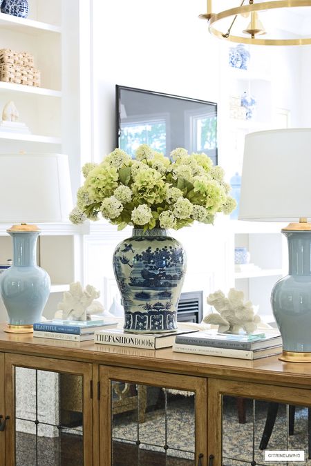 Create a stunning faux floral arrangement with these stunning hydrangeas in a chic blue and white oversized ginger jar💙

#LTKstyletip #LTKhome
