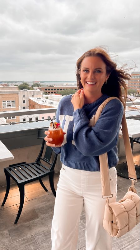 Windy in Charleston! Wearing a Medium in this USA cropped sweater. I finally got the viral amazon purse and love it! I fits more than you’d think  

#LTKSeasonal #LTKunder100 #LTKunder50