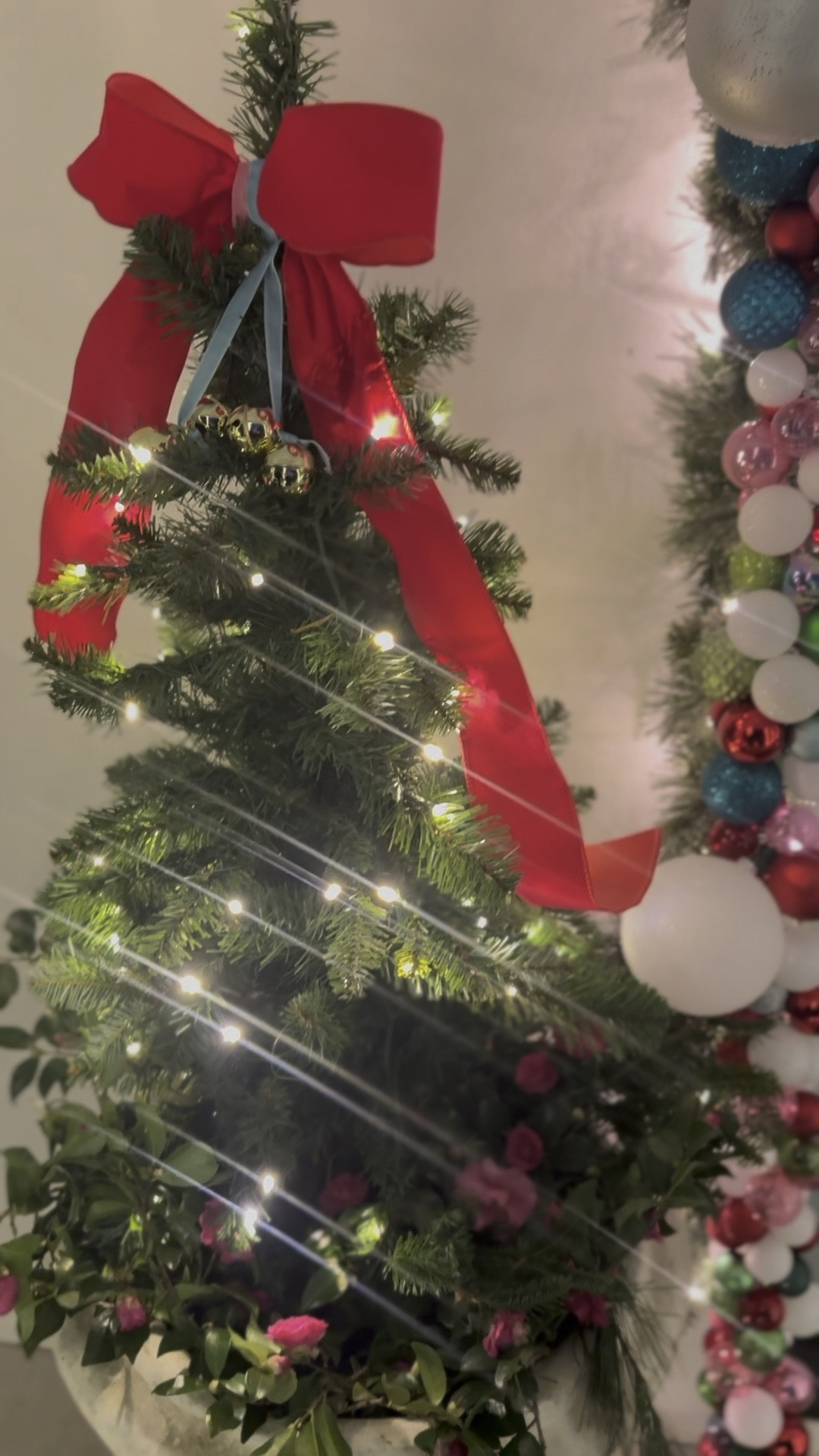 light up trees w ribbon for front porch ❤️🎄 and ornament garland i made this but also linking some you can buy! 

#LTKHoliday #LTKSeasonal #LTKWatchNow