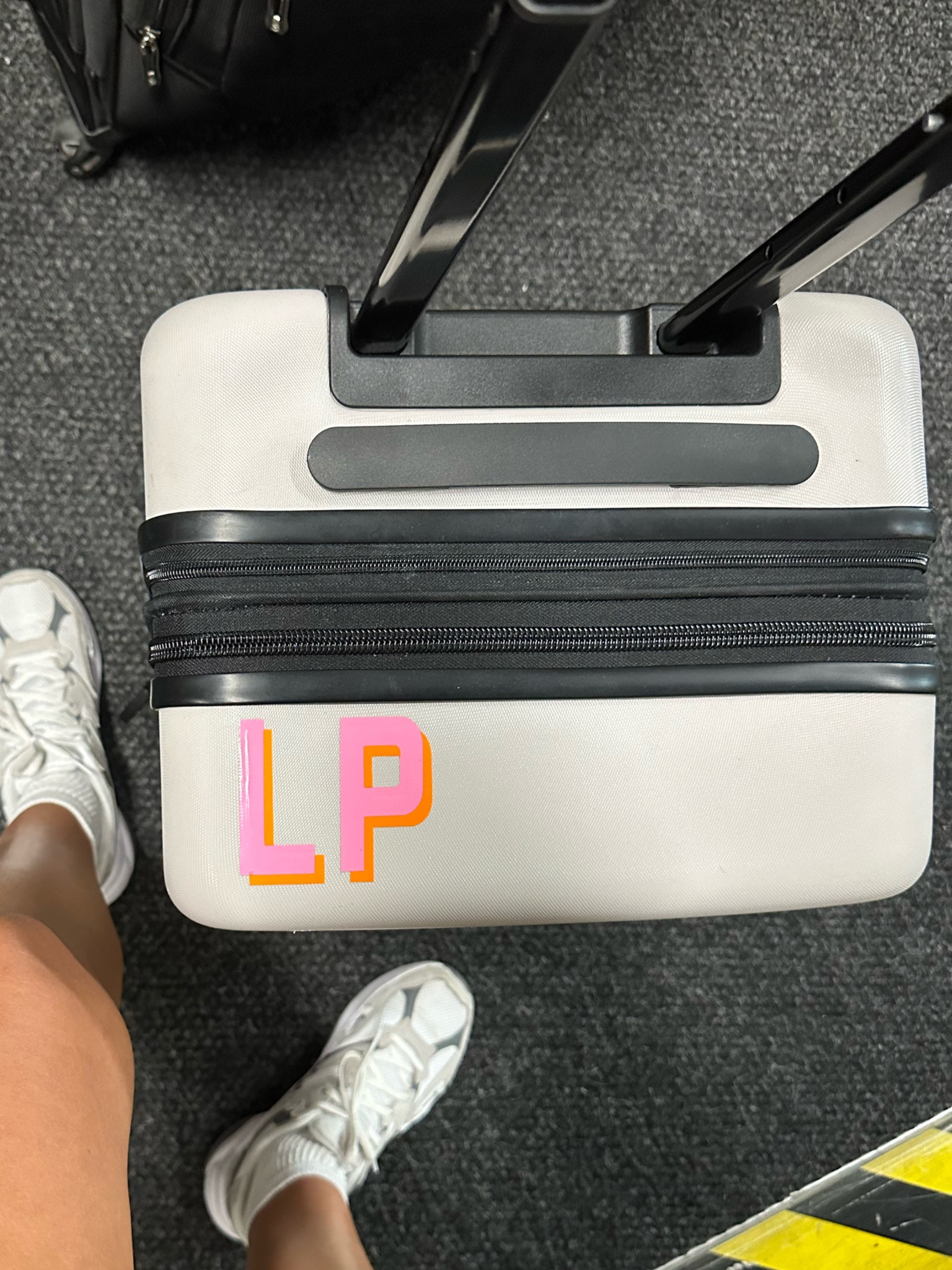 These initial stickers are SO cute for luggage!! helps you find your suitcase faster too!