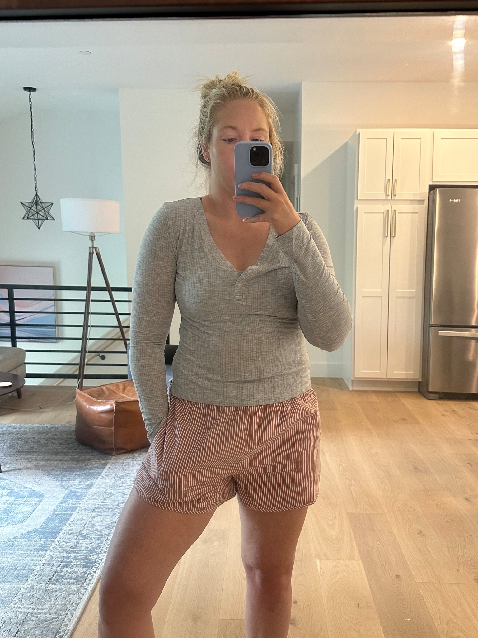 wearing medium in both the top and shorts   
