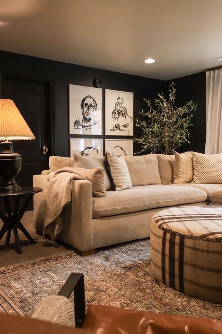 Loved how moody our Idaho family room was with those dark walls 😍

Sketch artwork, linen couch, rug, custom ottoman, olive tree

#LTKhome #LTKfamily #LTKstyletip