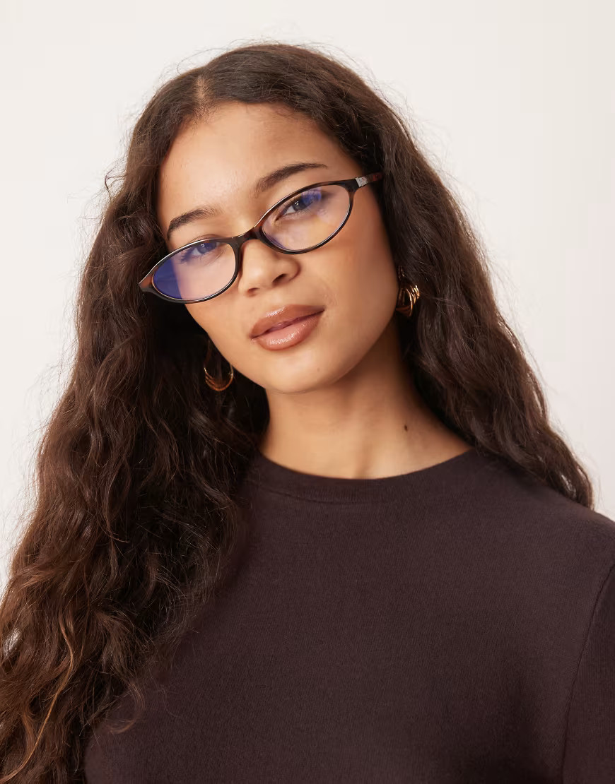ASOS DESIGN clear blue light lens slim oval glasses in tort-Brown | ASOS (Global)