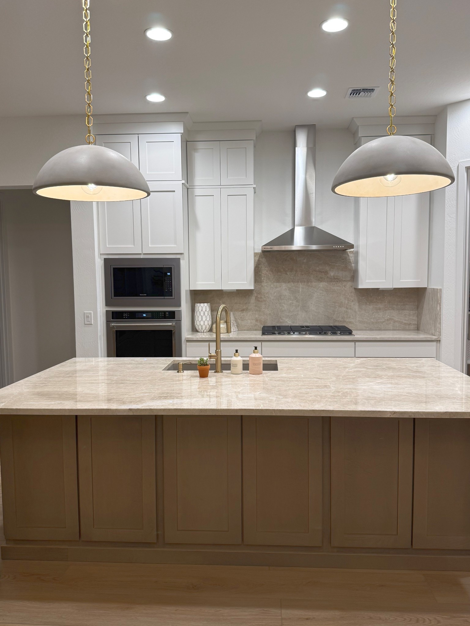 These pendant lights have been on my wishlist for years…. I couldn’t find anything comparable that I liked as much so I did it. Worth every penny! FYI they’re super heavy, so make sure your fixture accommodates that weight. 