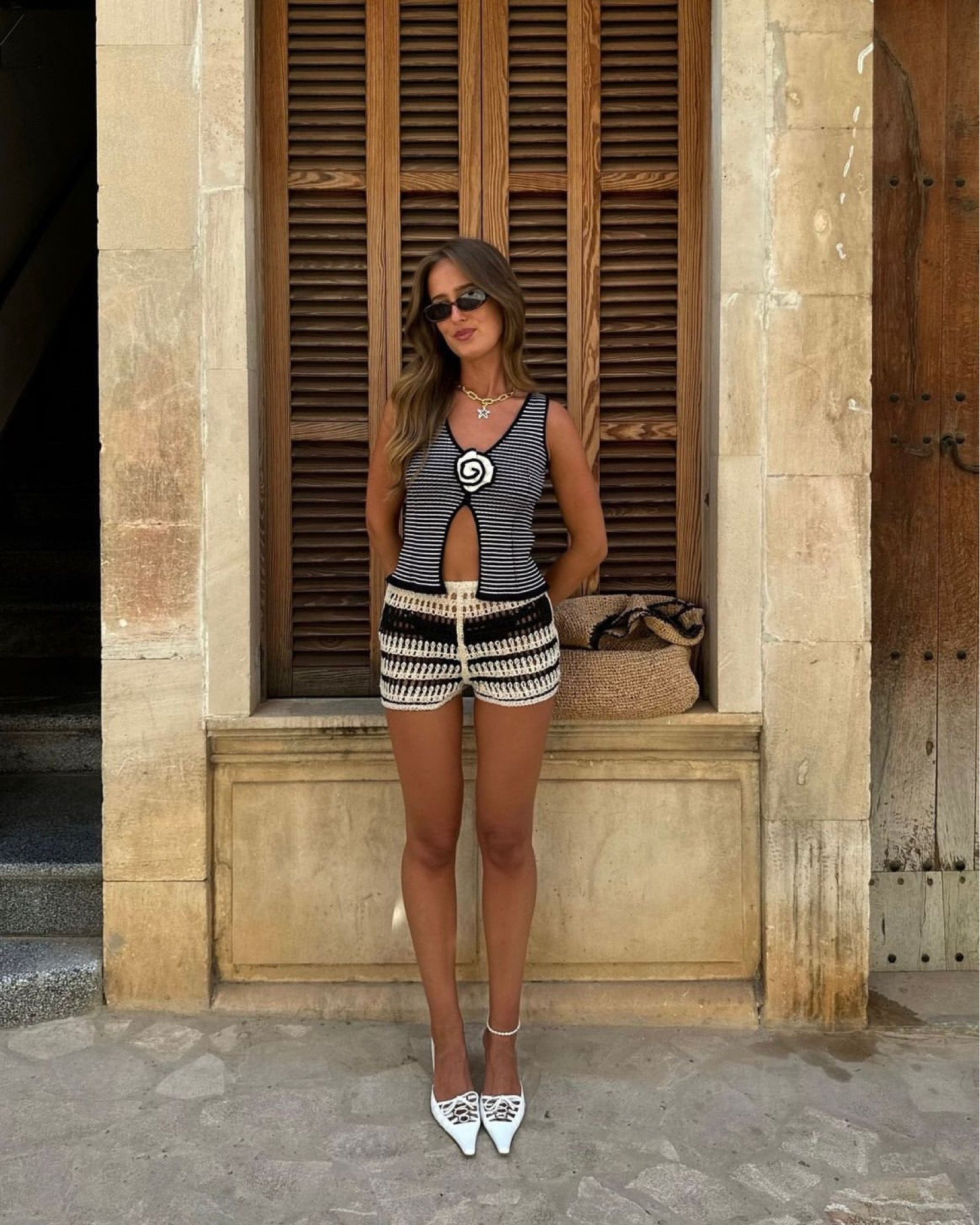 Zara crochet striped shorts, black and white stripes, knit vest top, star necklaces statement jewellery, white mule, kitten heels, le specs sunglasses, Emma pills necklace, tach top, Anthropologie beach bag, summer outfit, holiday outfit, Euro, city break, vacation 

#LTKeurope #LTKsummer #LTKuk