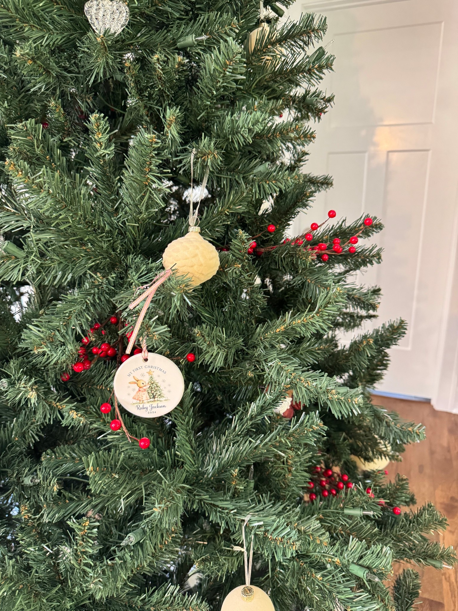 Christmas tree decor ideas 🎄 added red holly berry stems and ornaments for a cozy, classic holiday look!

#LTKHoliday